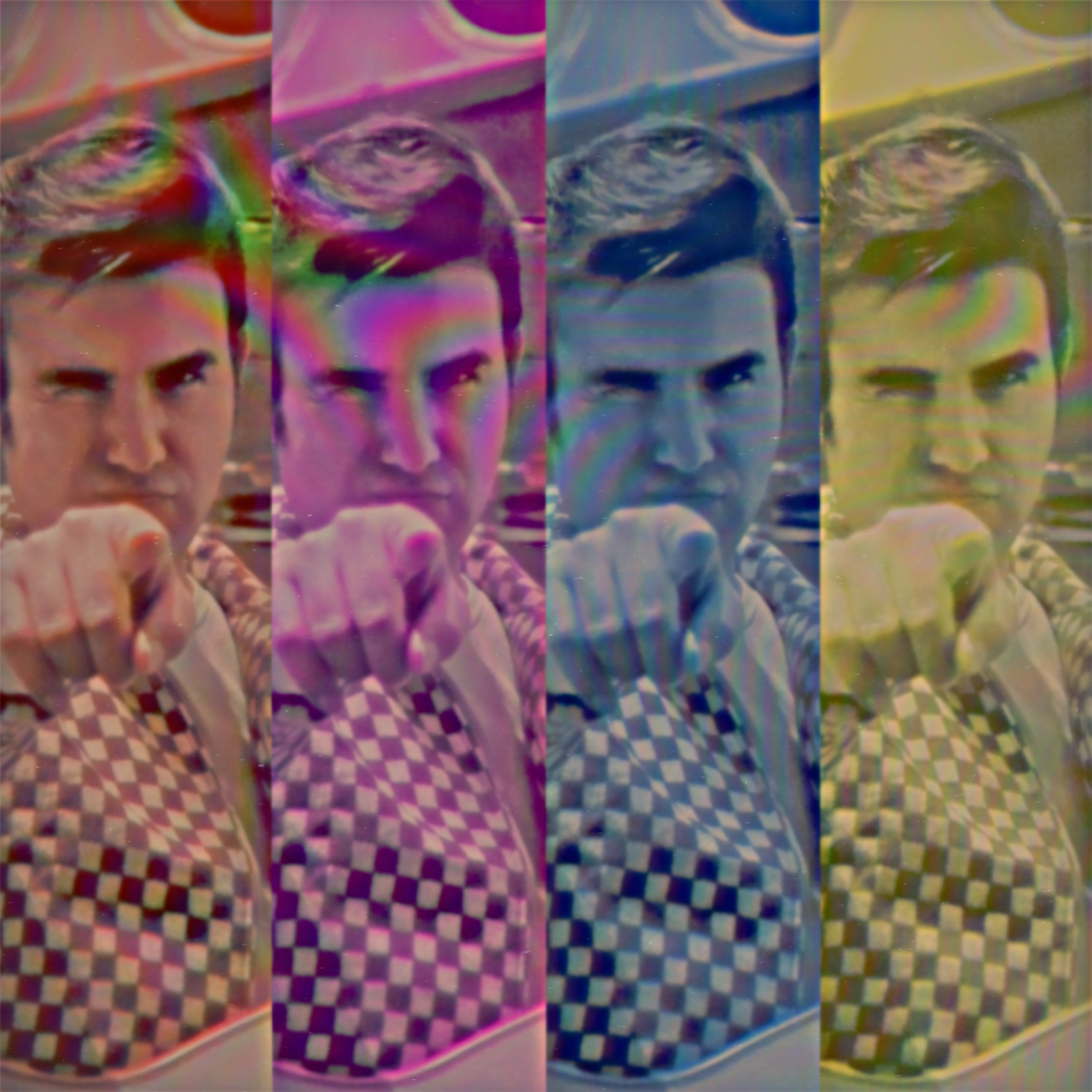 a man is pointing his finger at the camera