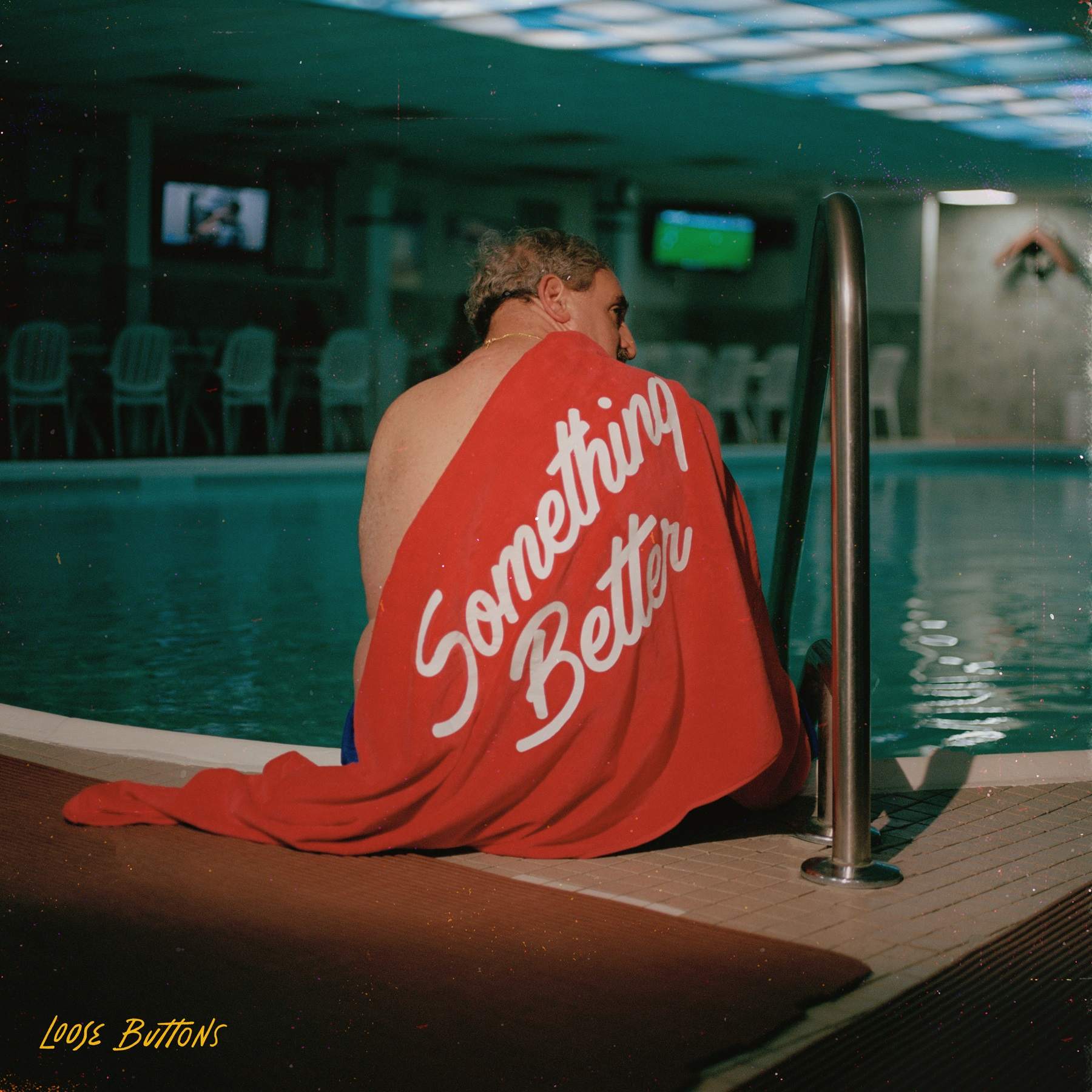 Loose Buttons - Something Better: a man sitting next to a pool with a red towel