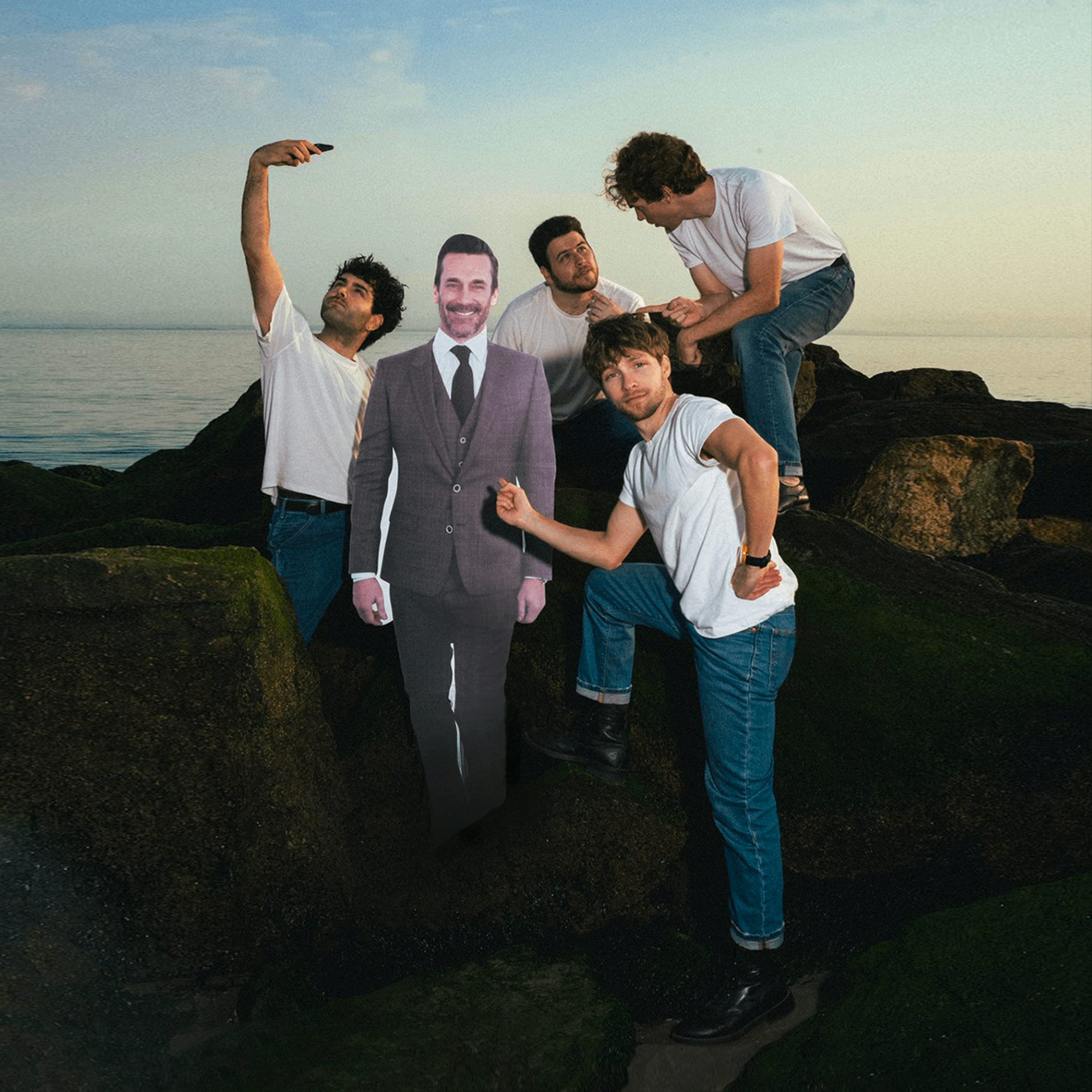 Loose Buttons - I Saw Jon Hamm At The Beach: a group of men posing for a picture