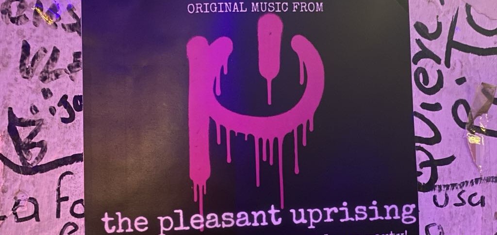 a poster for the pleasant upsizing on a wall