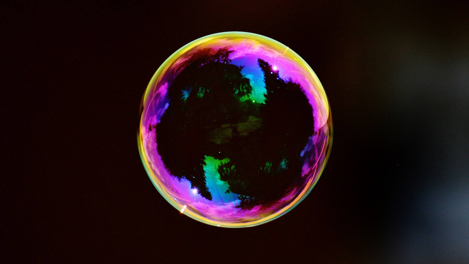 a colorful soap bubble floating in the air