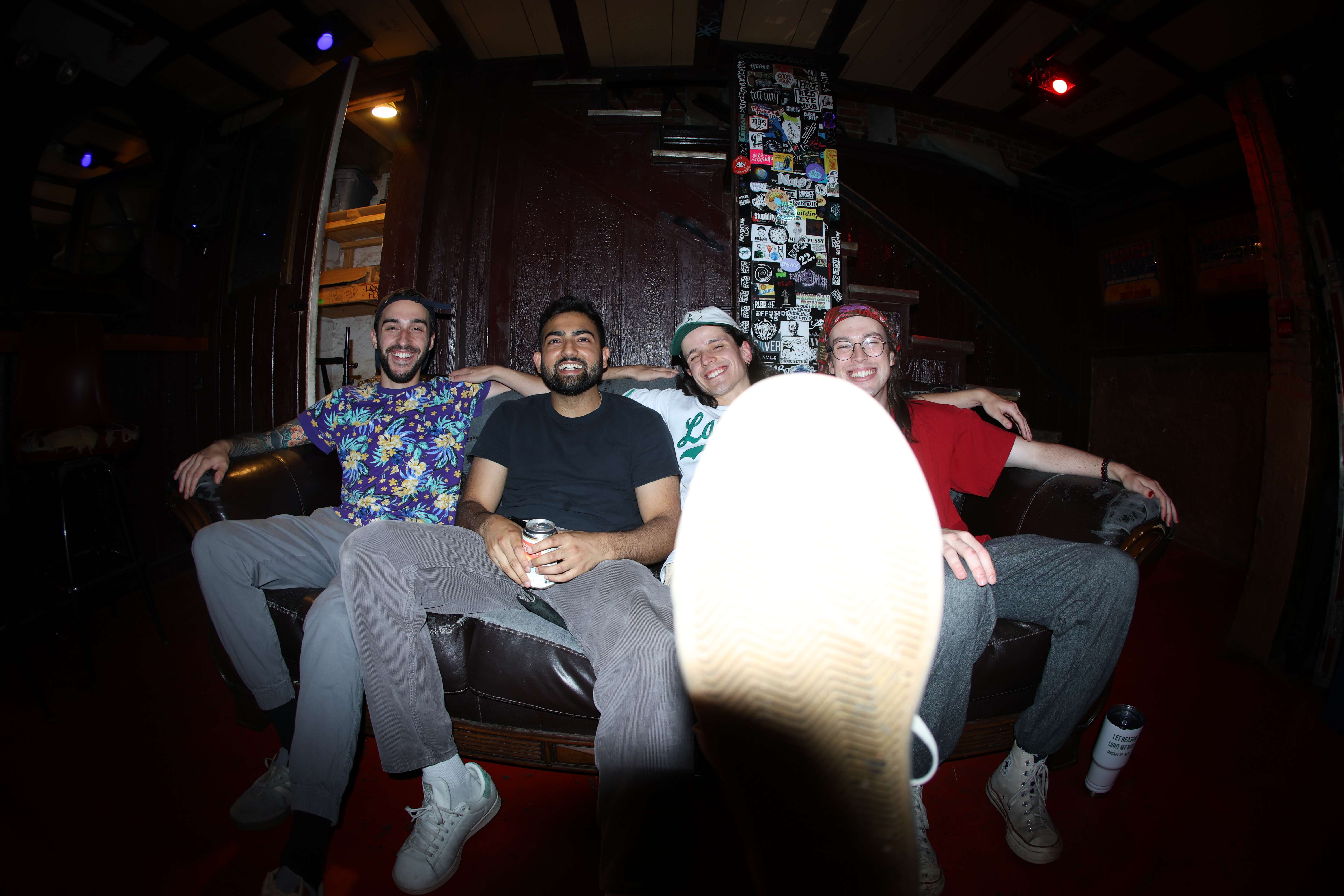 a group of people sitting on a couch