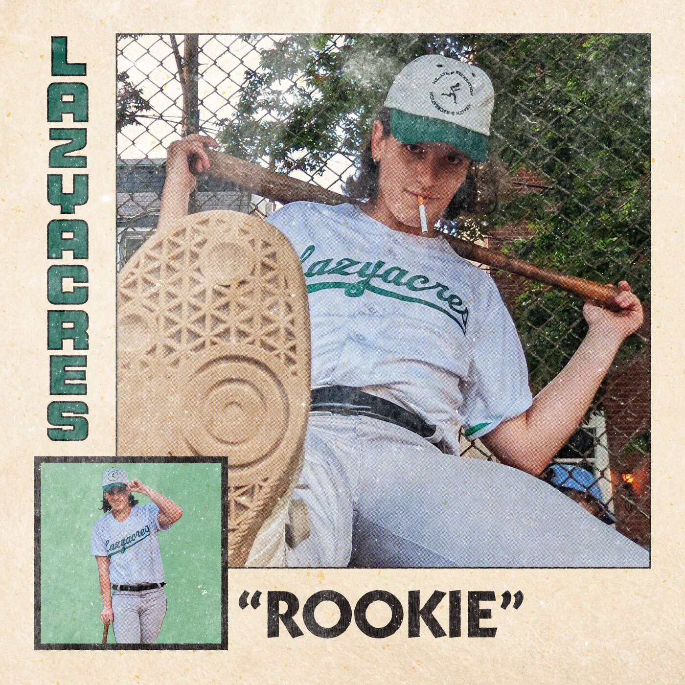 a photo of a baseball player posing with a bat