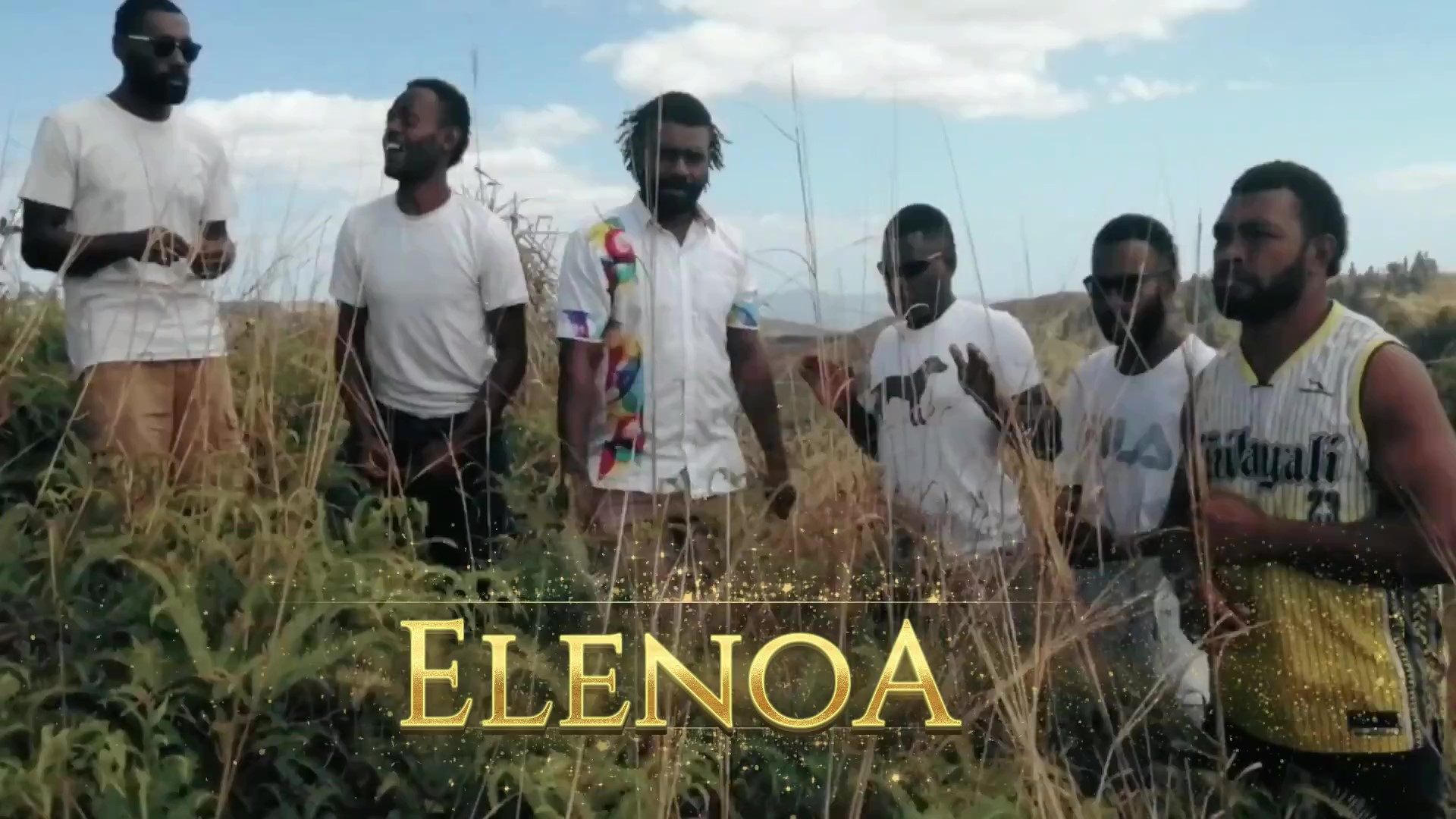 Kabuvuka kei Nakoroboya - Elenoa: a group of men standing in a field with the word elena
