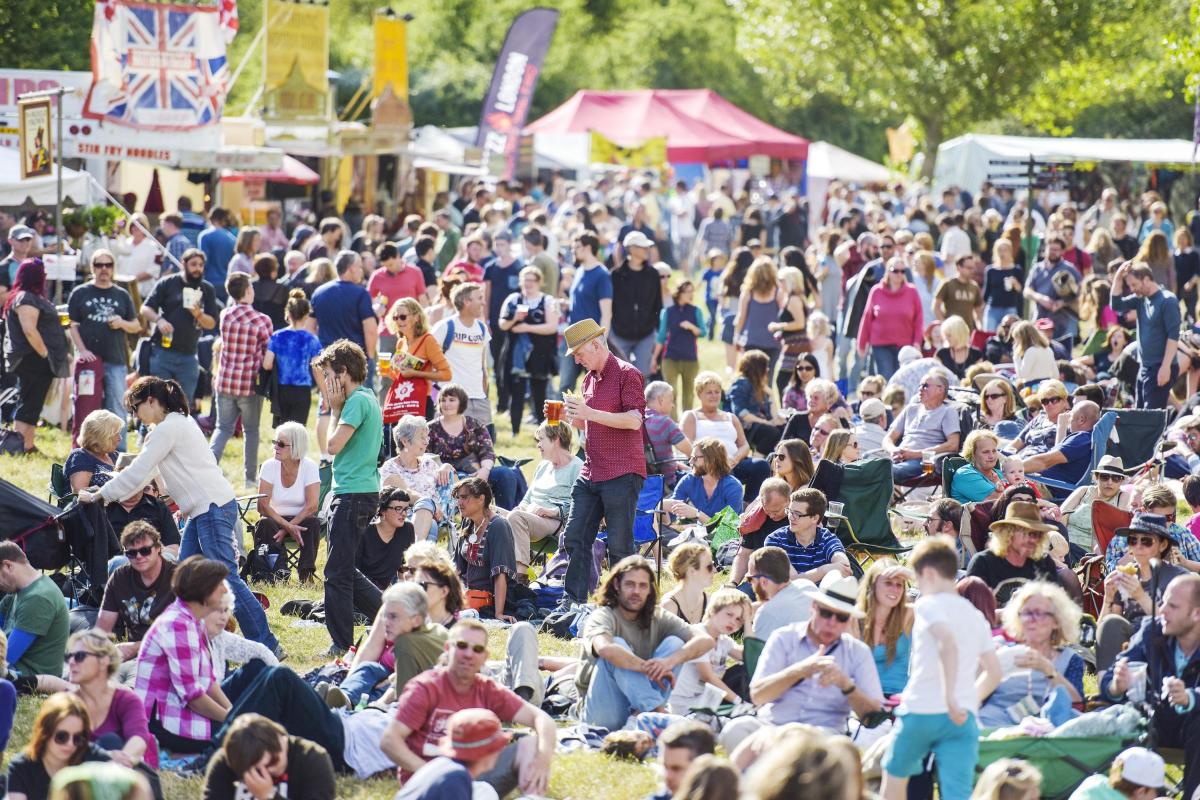 a crowd of people at an outdoor festival