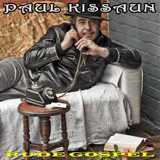 Paul Kissaun  - Rude Gospel: a man is sitting on a couch with a phone on his lap