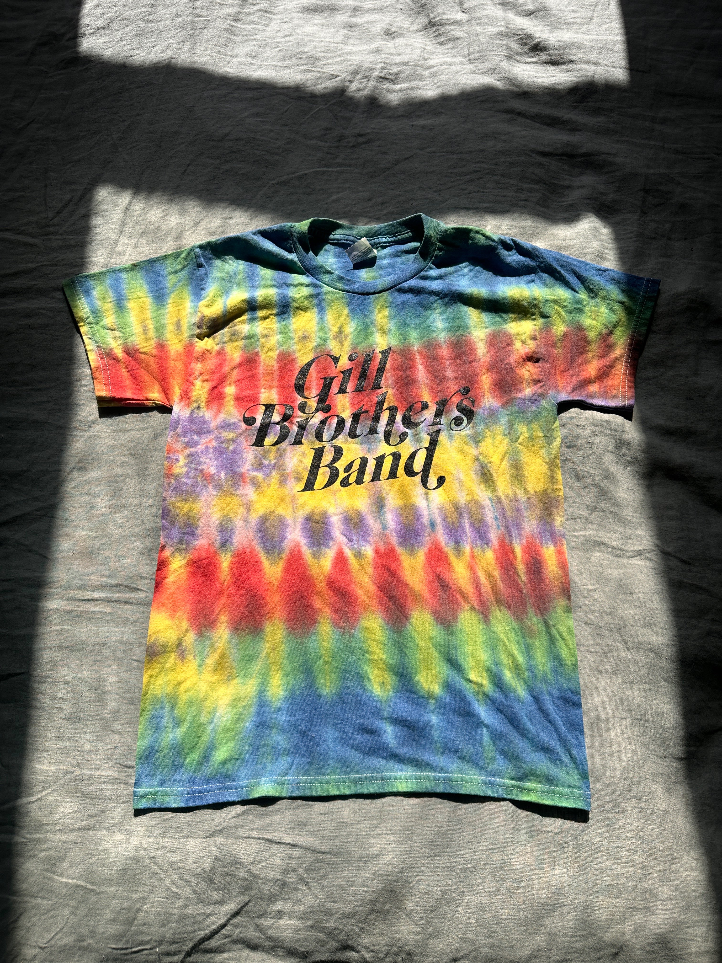 a tie dye t - shirt with the words'girls band'on it