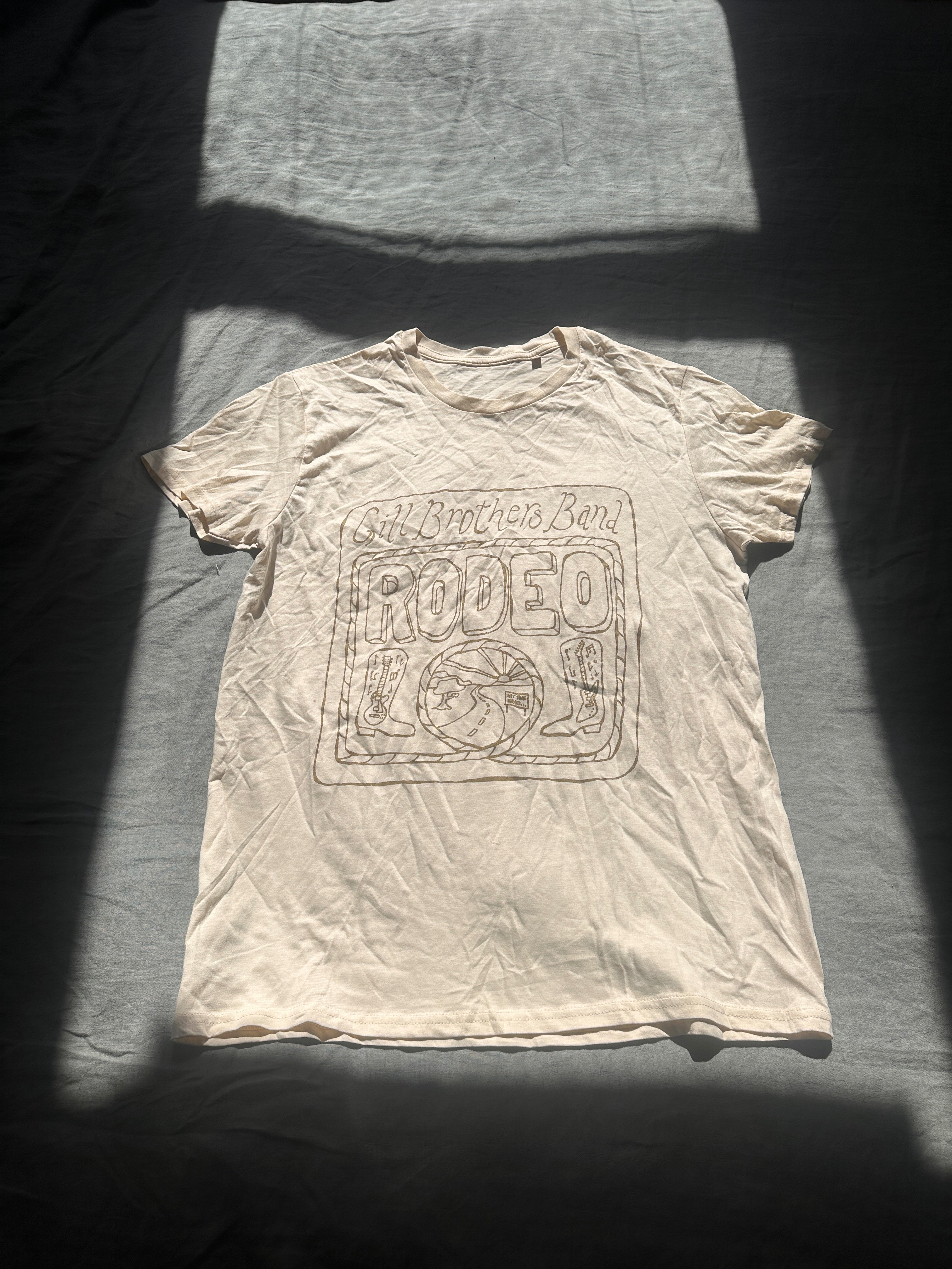 a white t - shirt with a design on it
