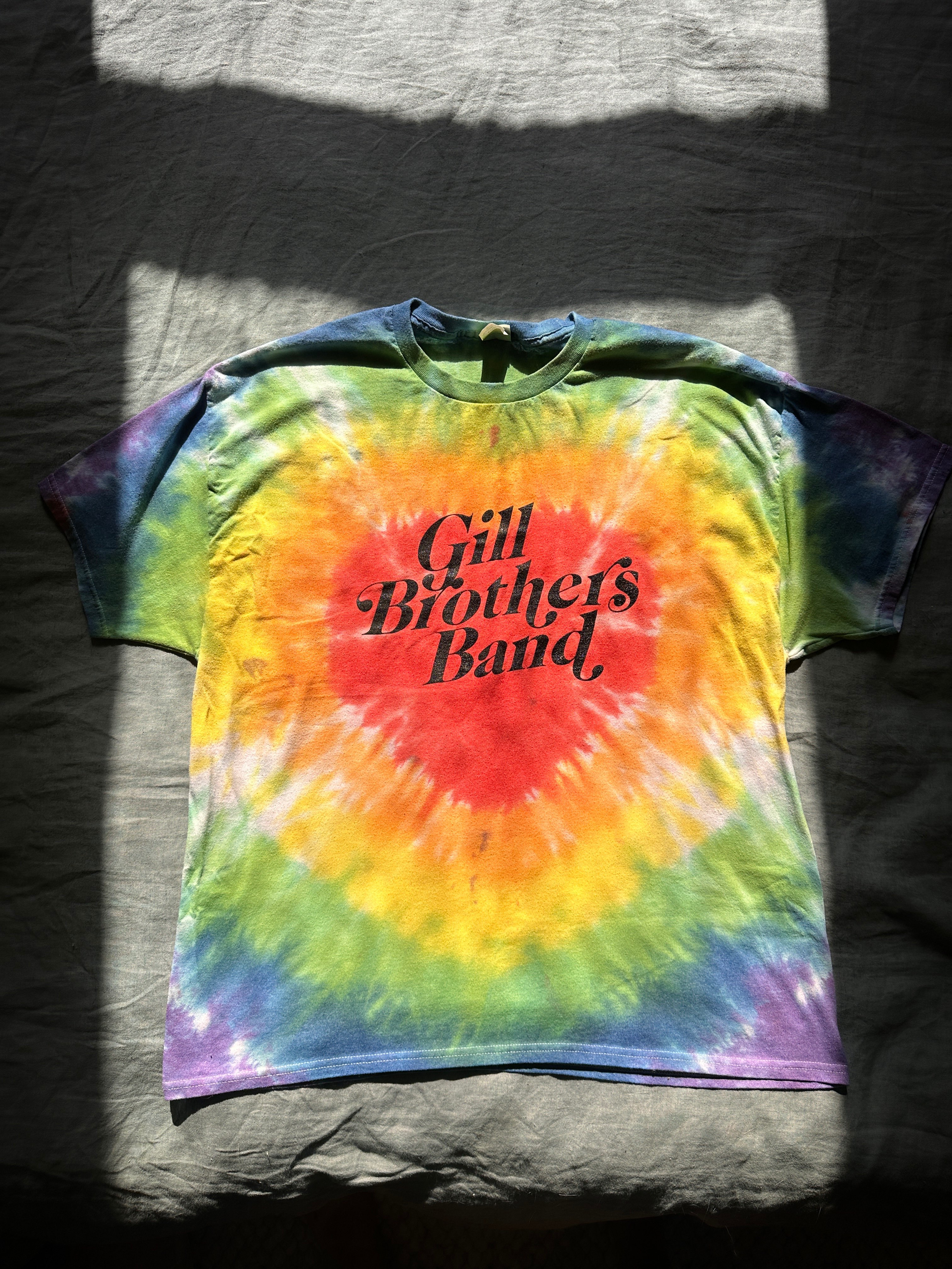 a tie dye t - shirt with the words'gill brothers band'on it