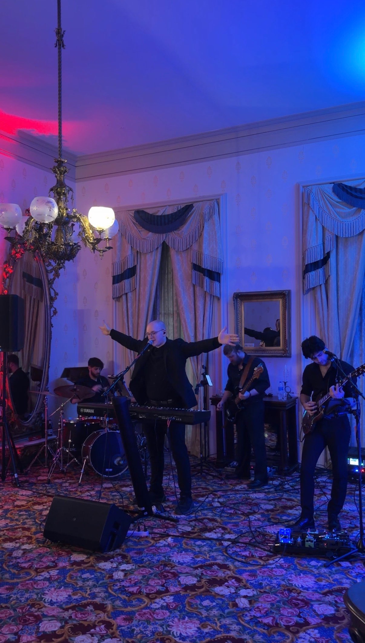 a group of people playing music in a room