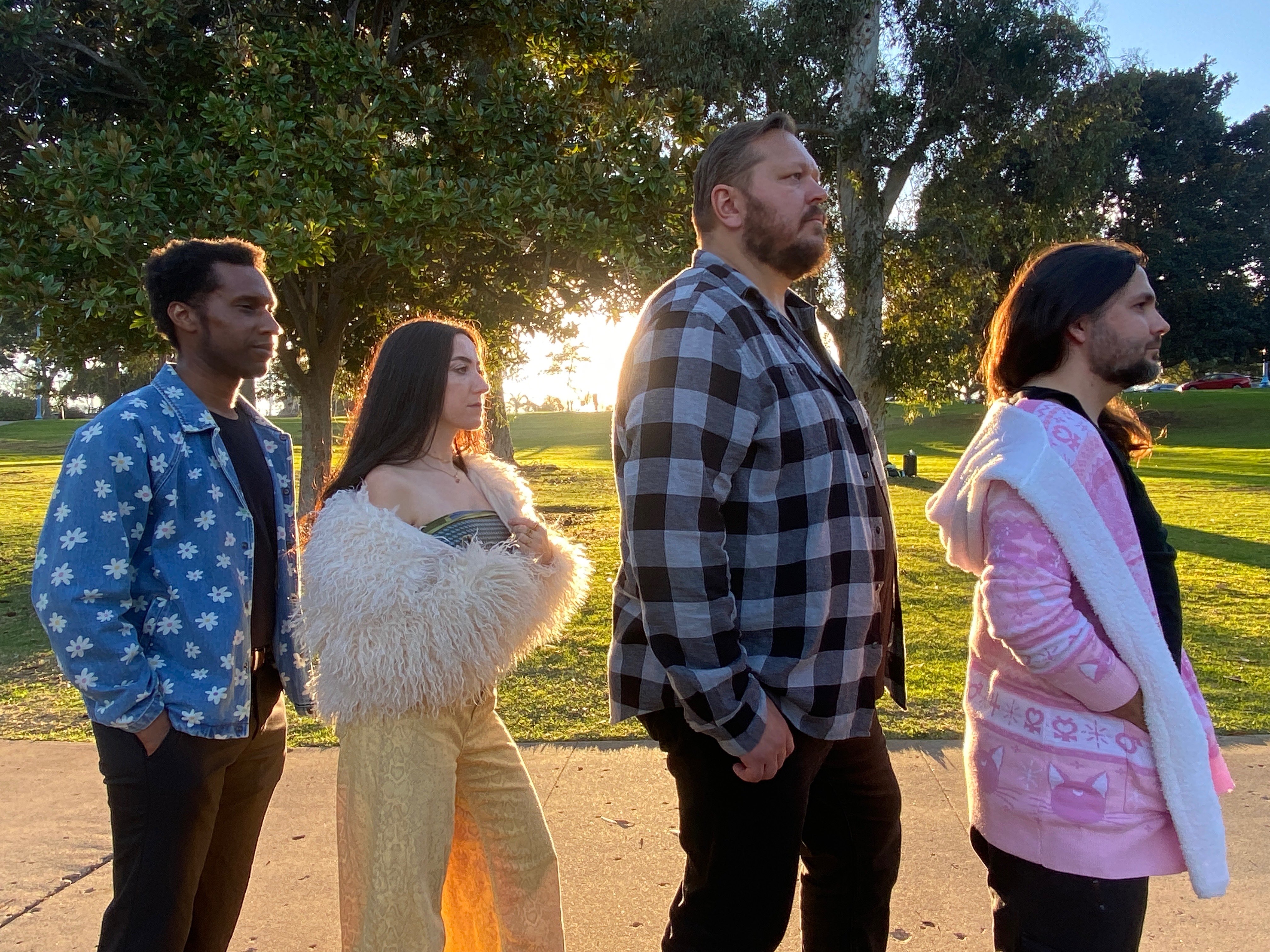 a group of people standing in a park