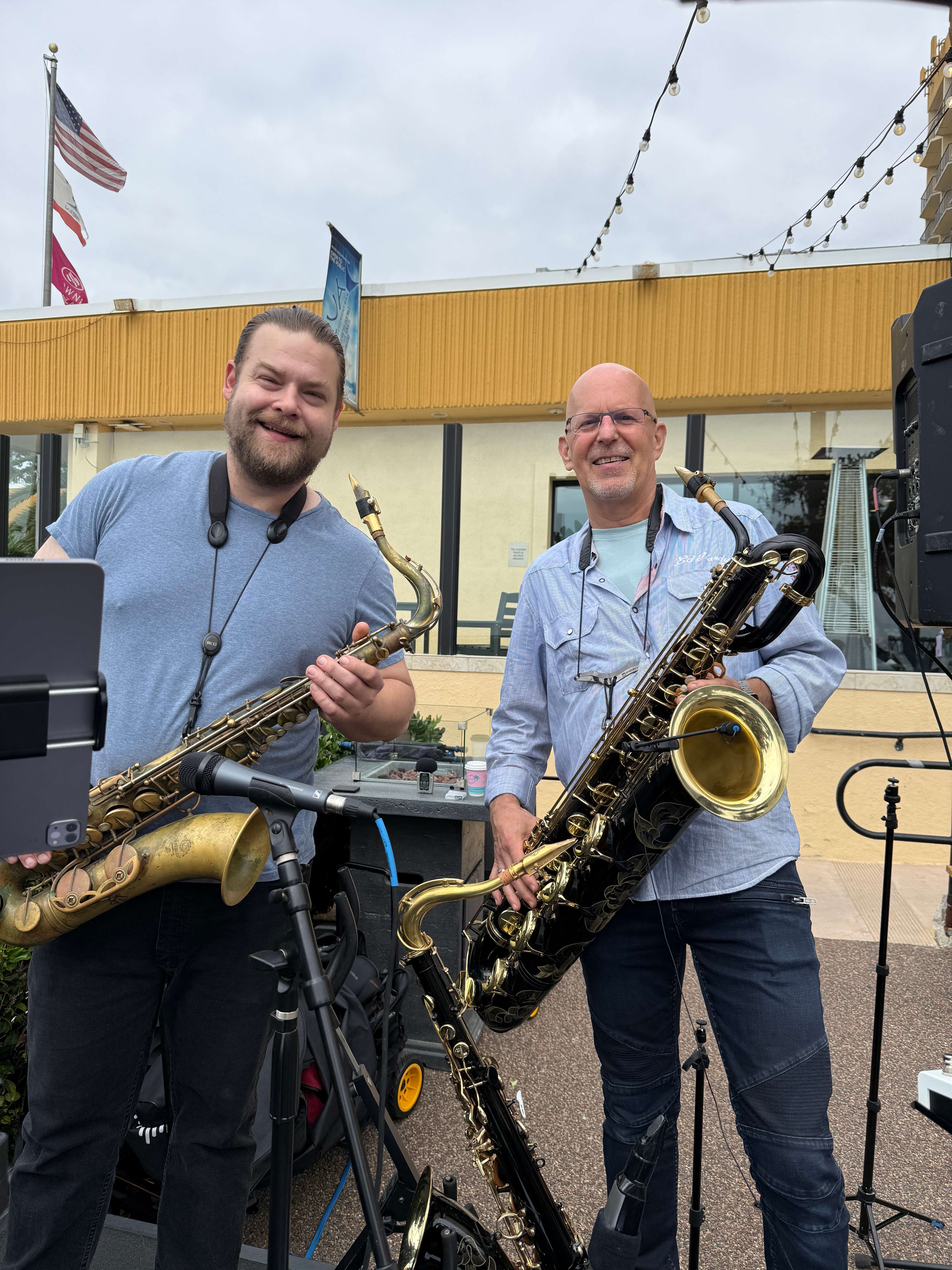 two men with saxophones