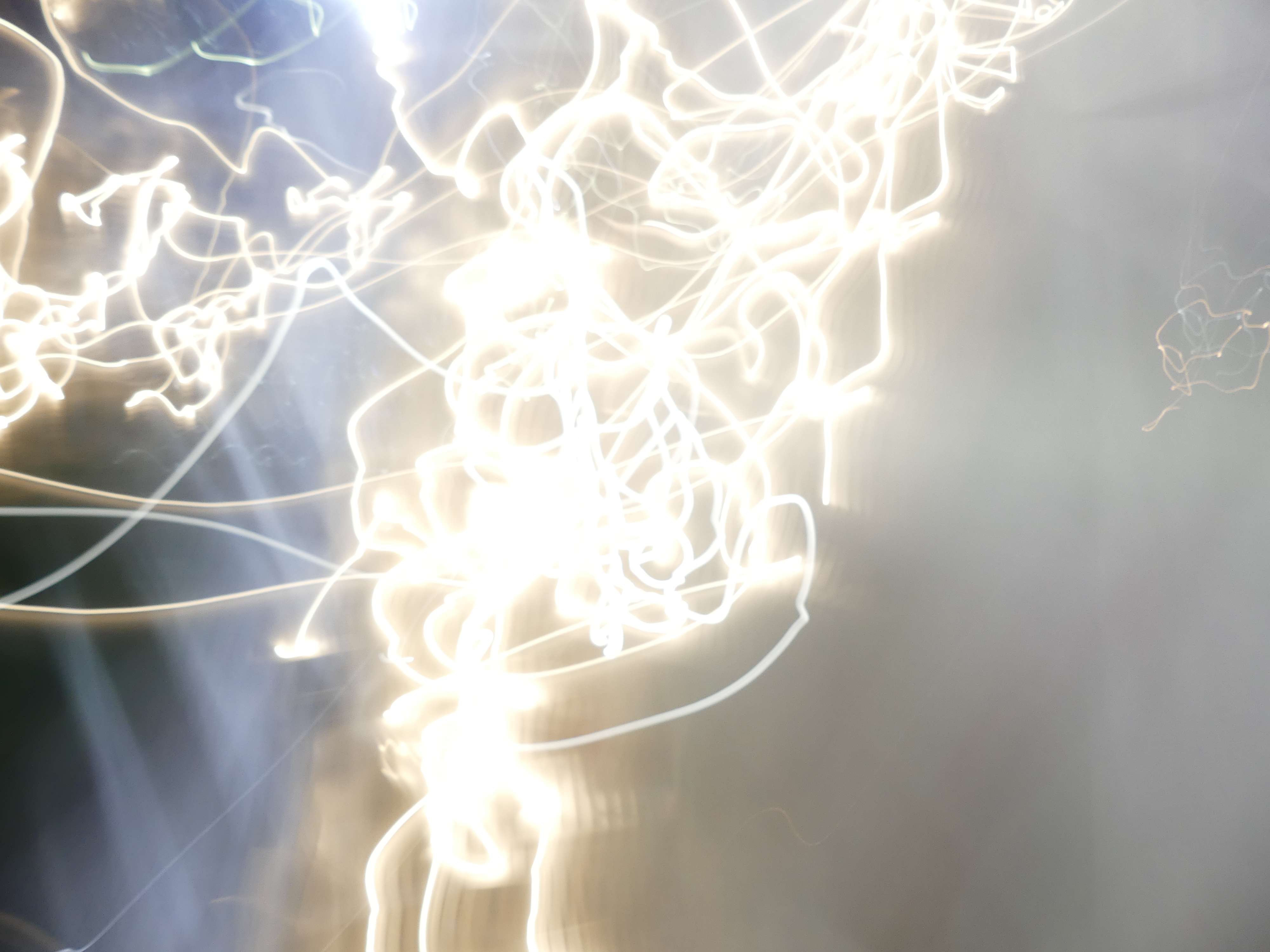 a photo of a man with light streaks on his face