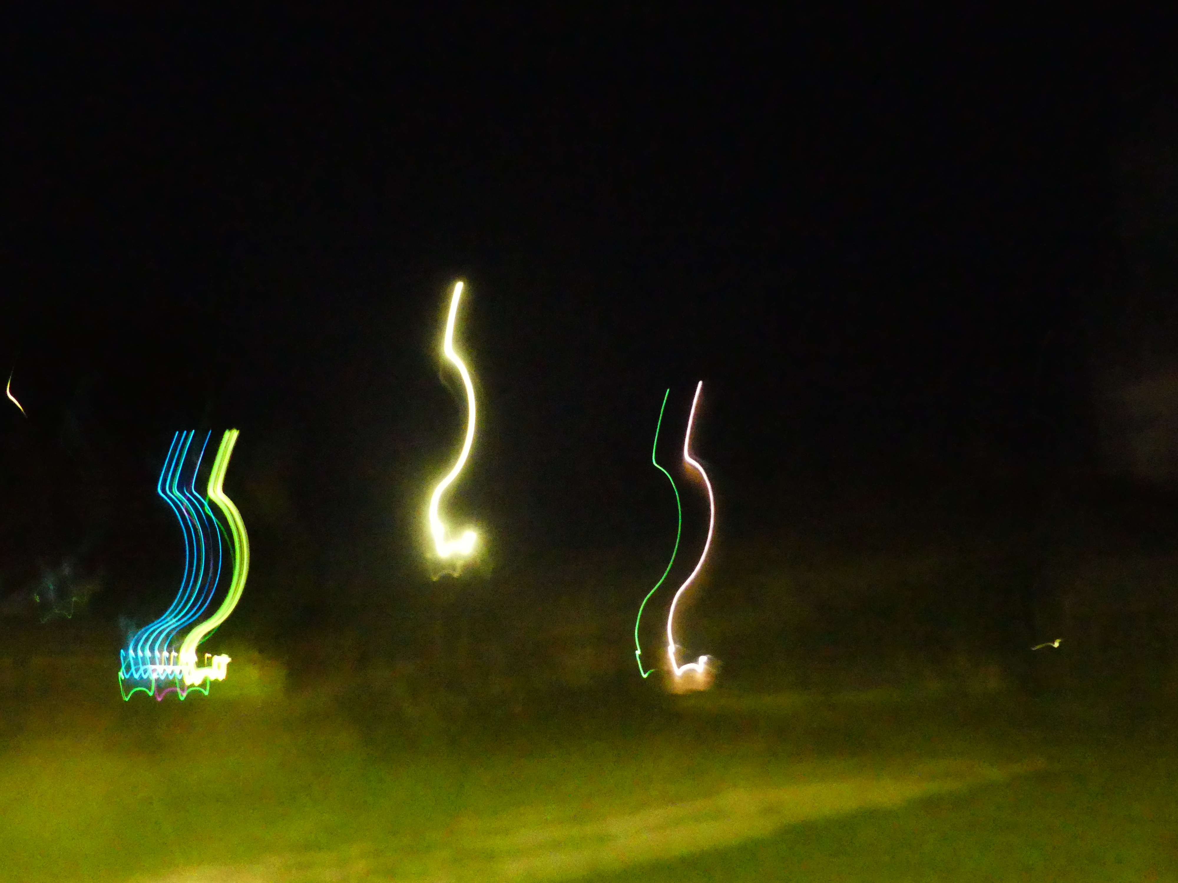 a blurry image of a field at night