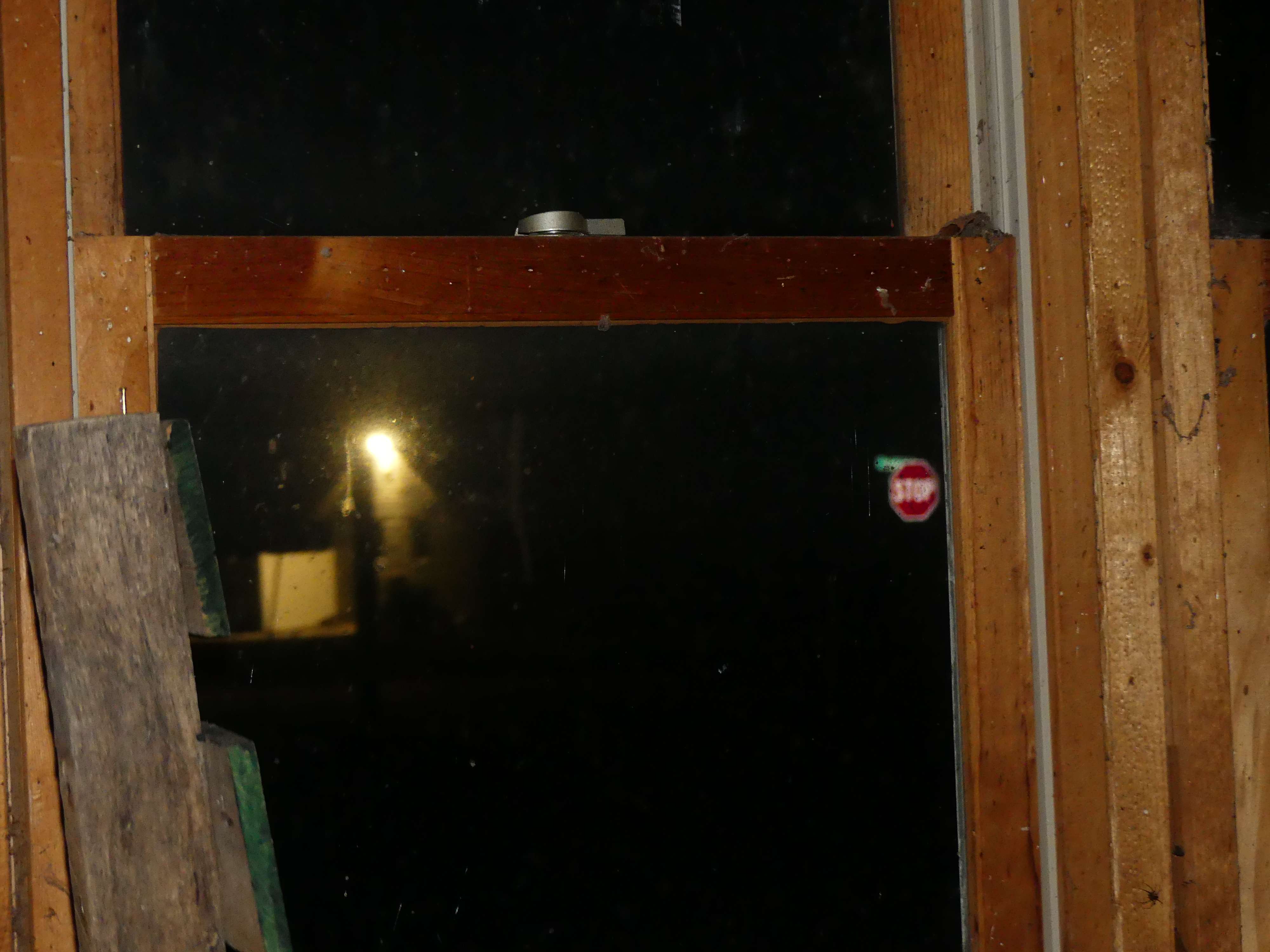 John California - Hell On Earth: a broken window in a house