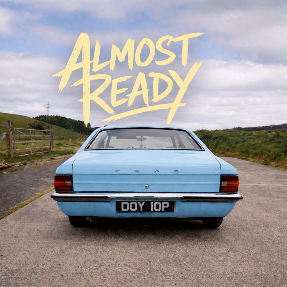 a blue car with the words almost ready on it