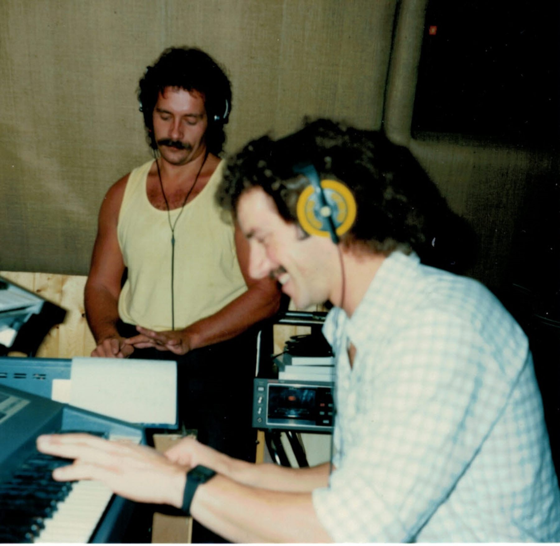 two men in a recording studio