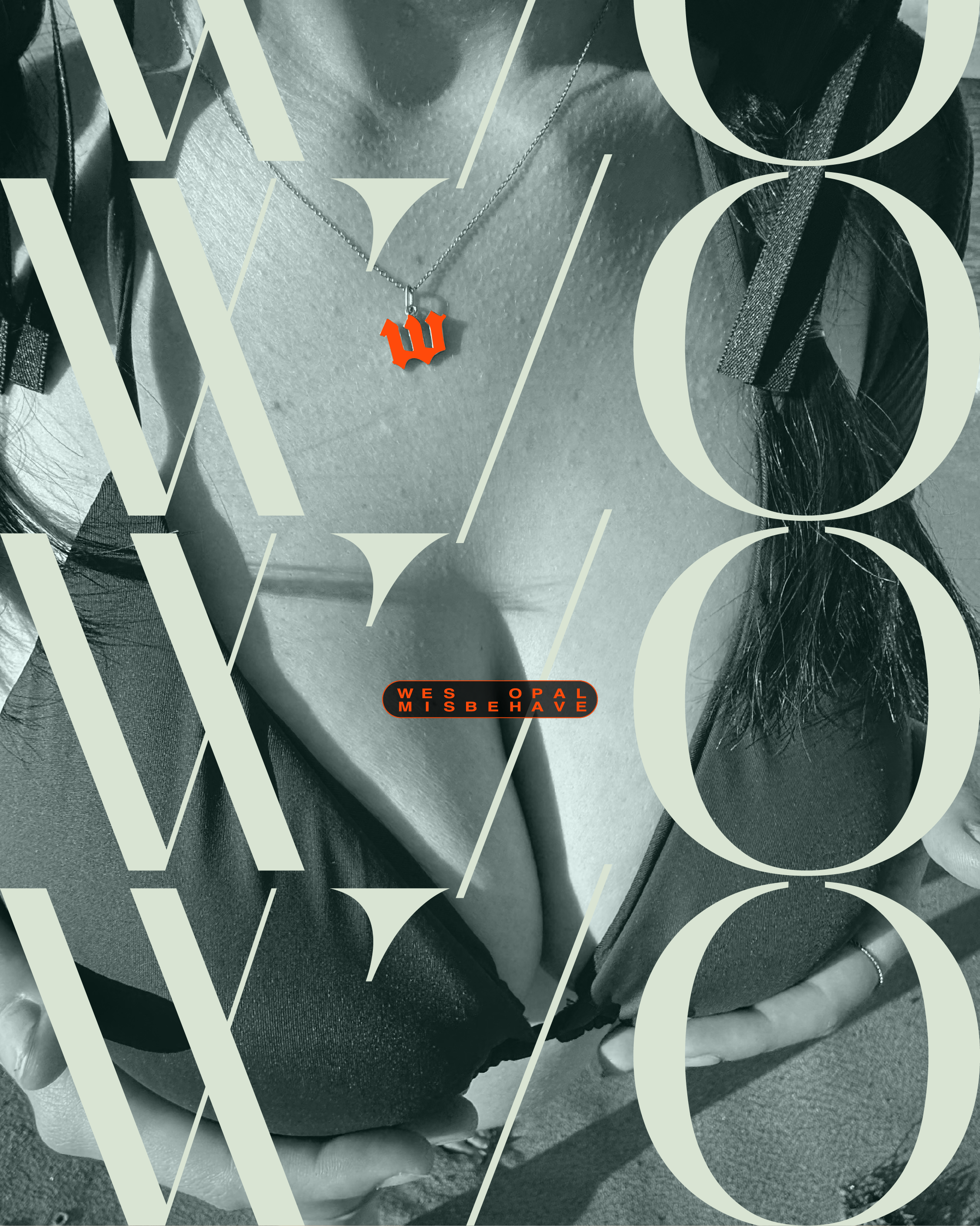 a woman in a bikini holding a necklace