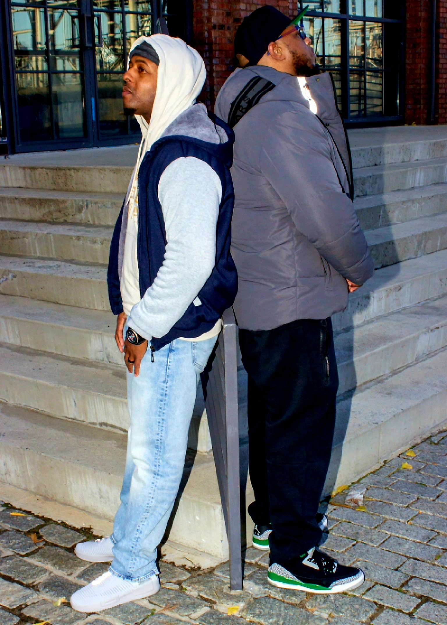 two men standing next to each other