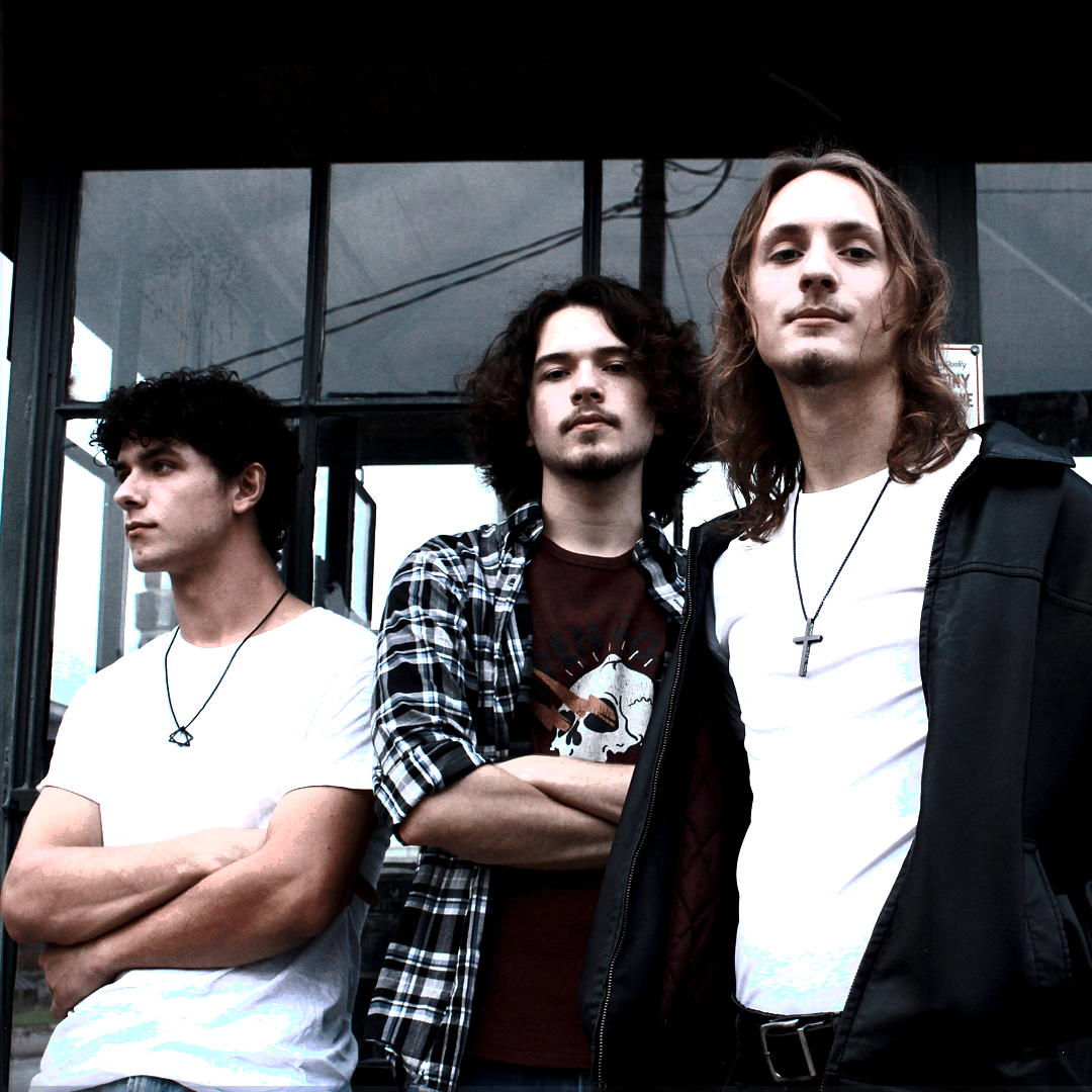 a group of men standing in front of a building