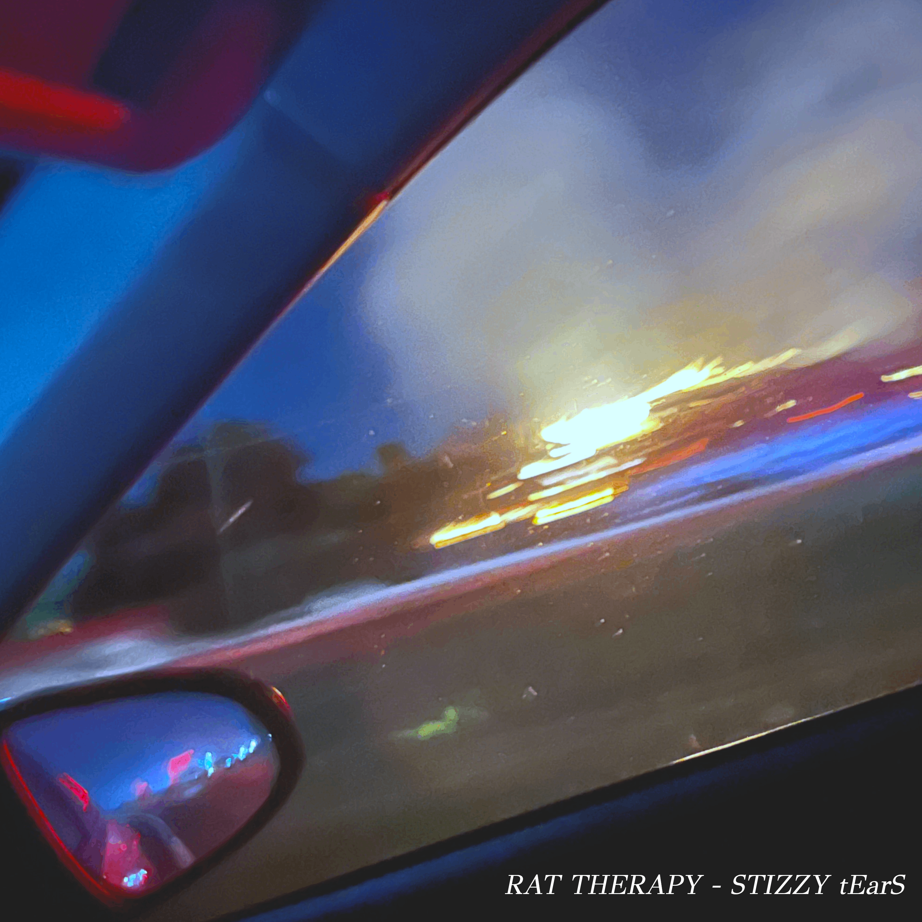 Rat Therapy - STIZZY tEarS: a car is driving down the road at night