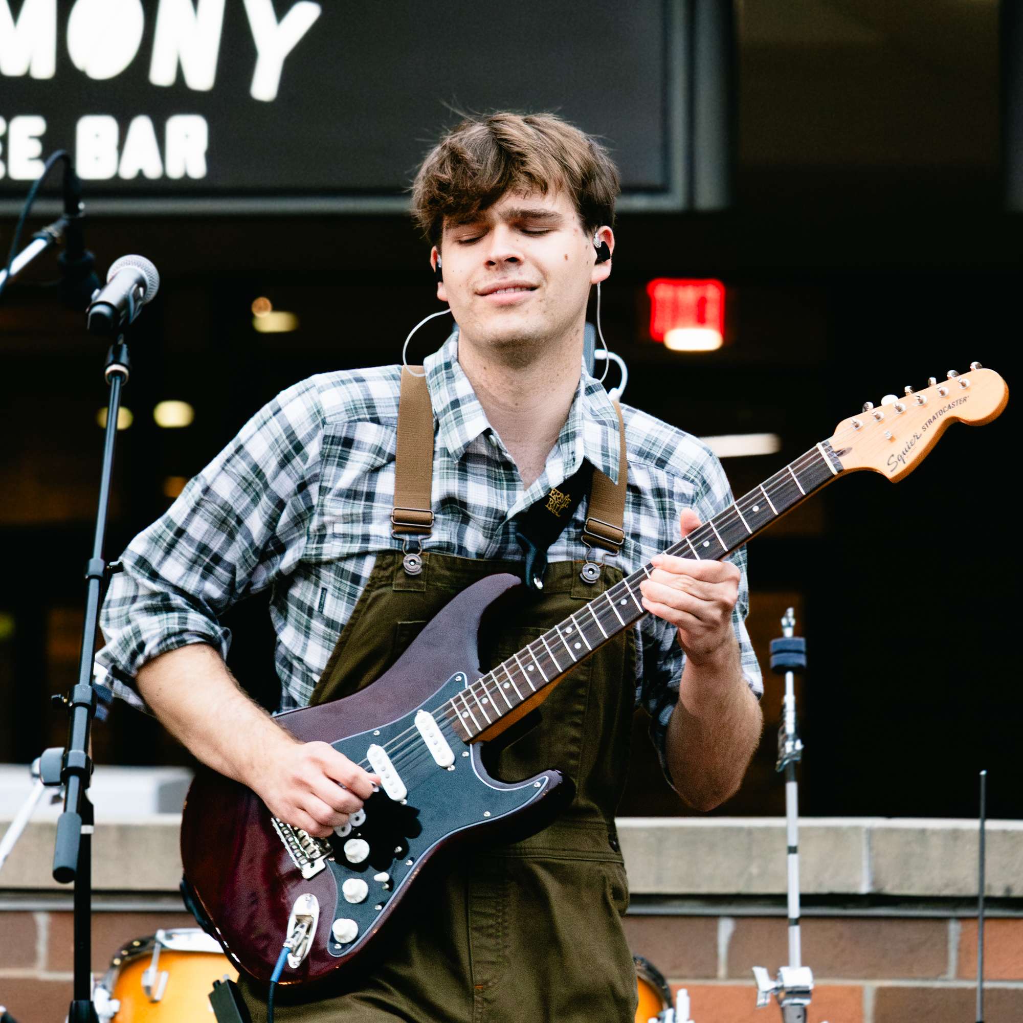 a man playing a guitar