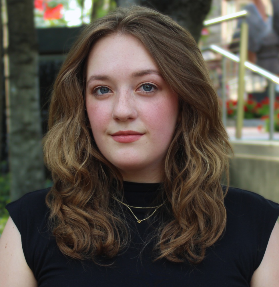a woman wearing a black top