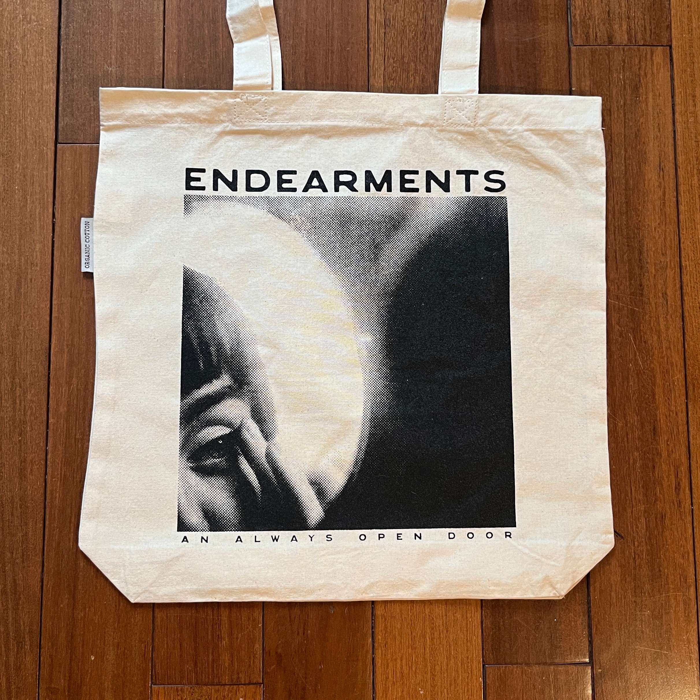 a tote bag with the words endearments on it