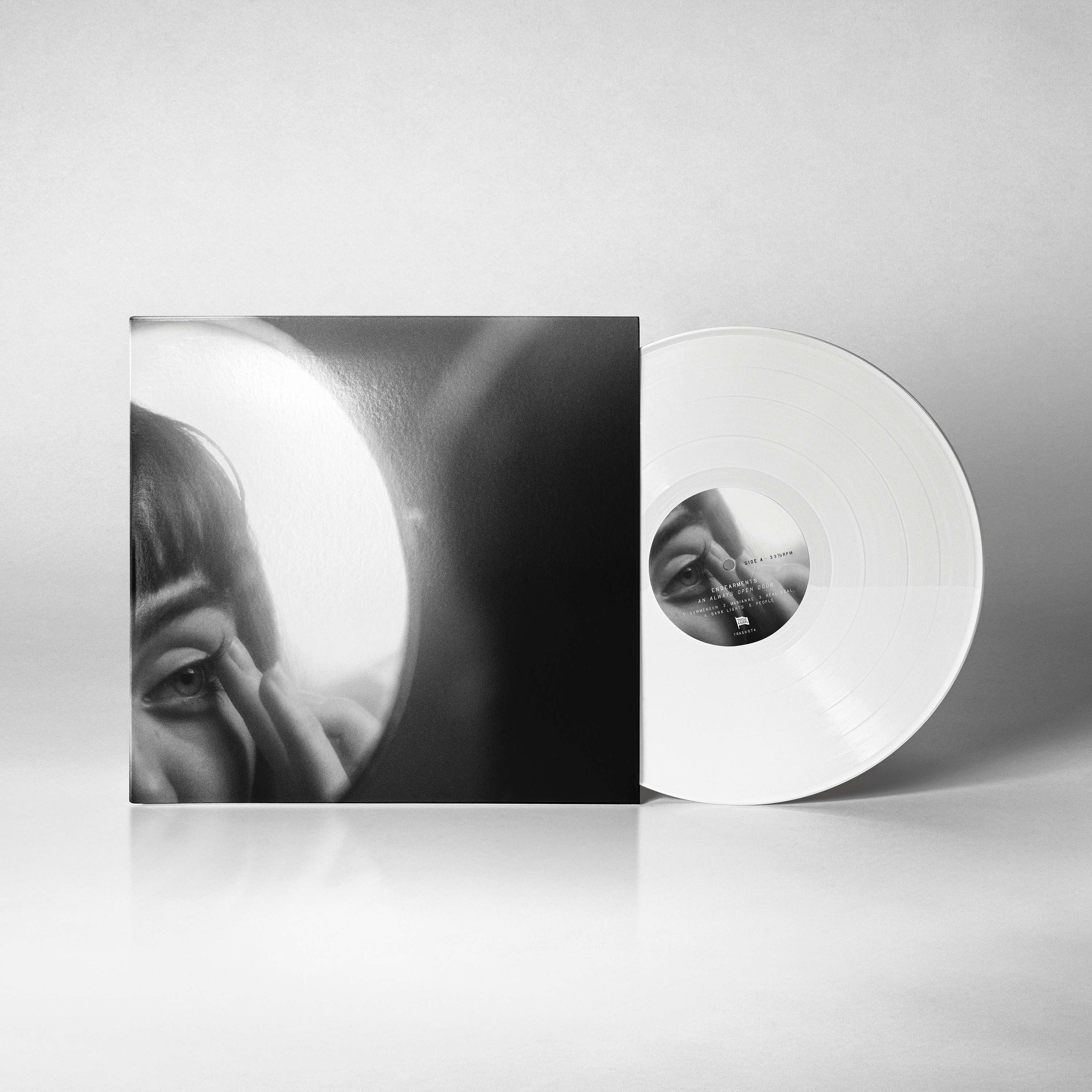 a white lp with a picture of a woman's face