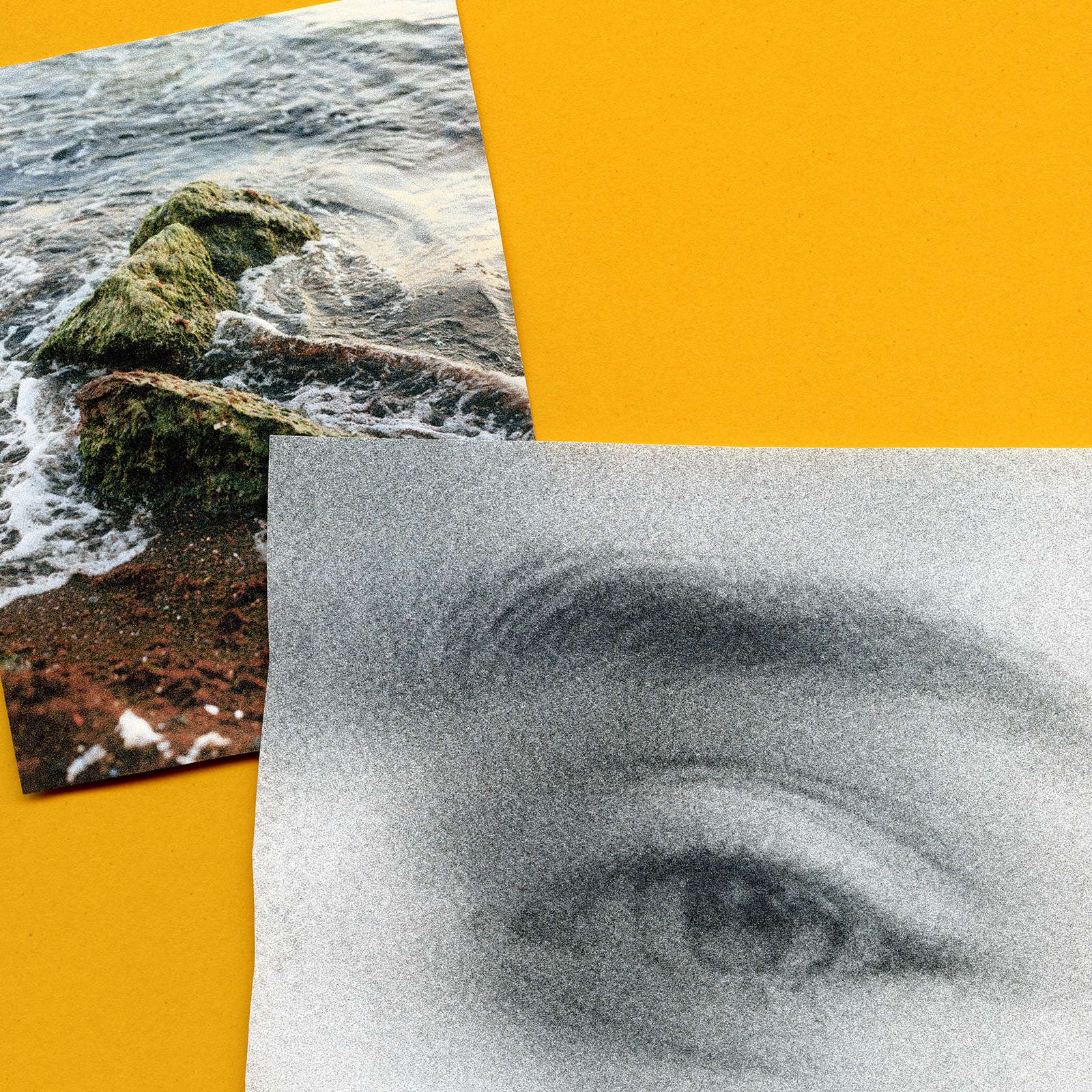 a photograph of a person's eye next to a piece of paper