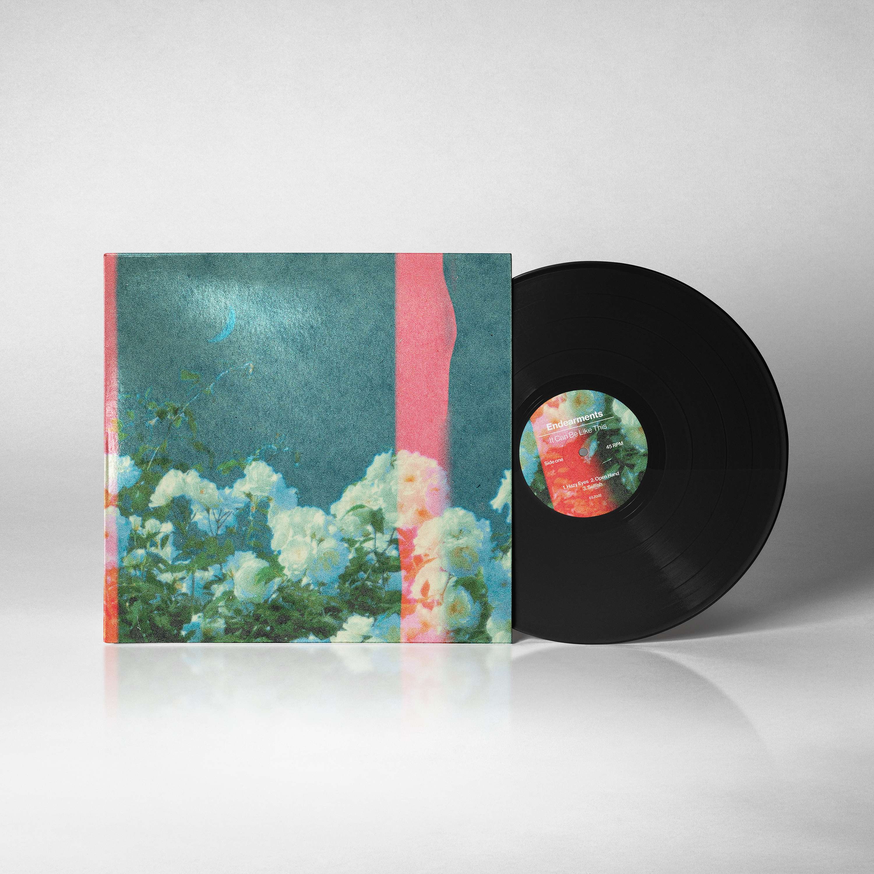 a black lp with flowers on it