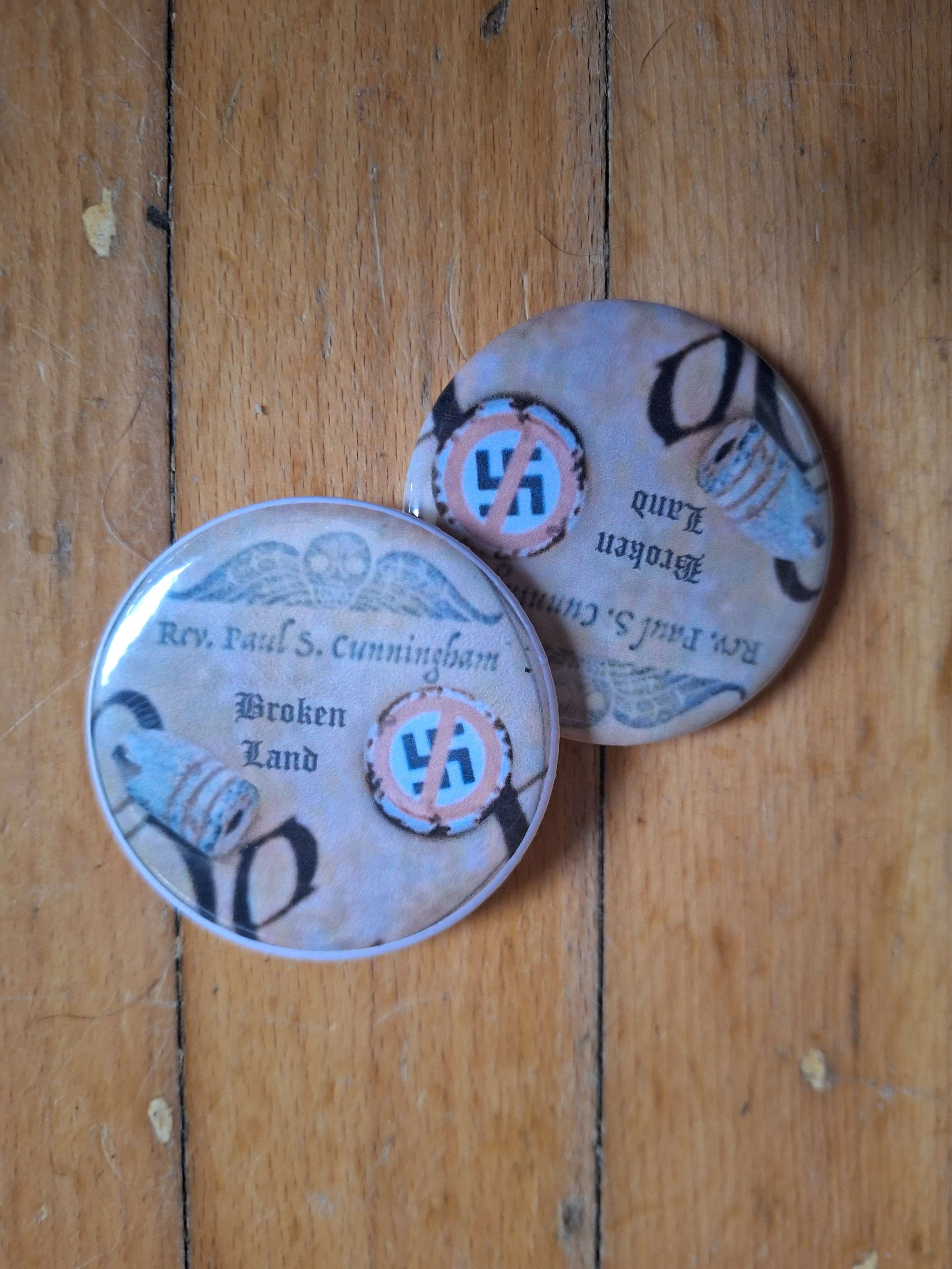 two buttons with a picture of a man and a woman