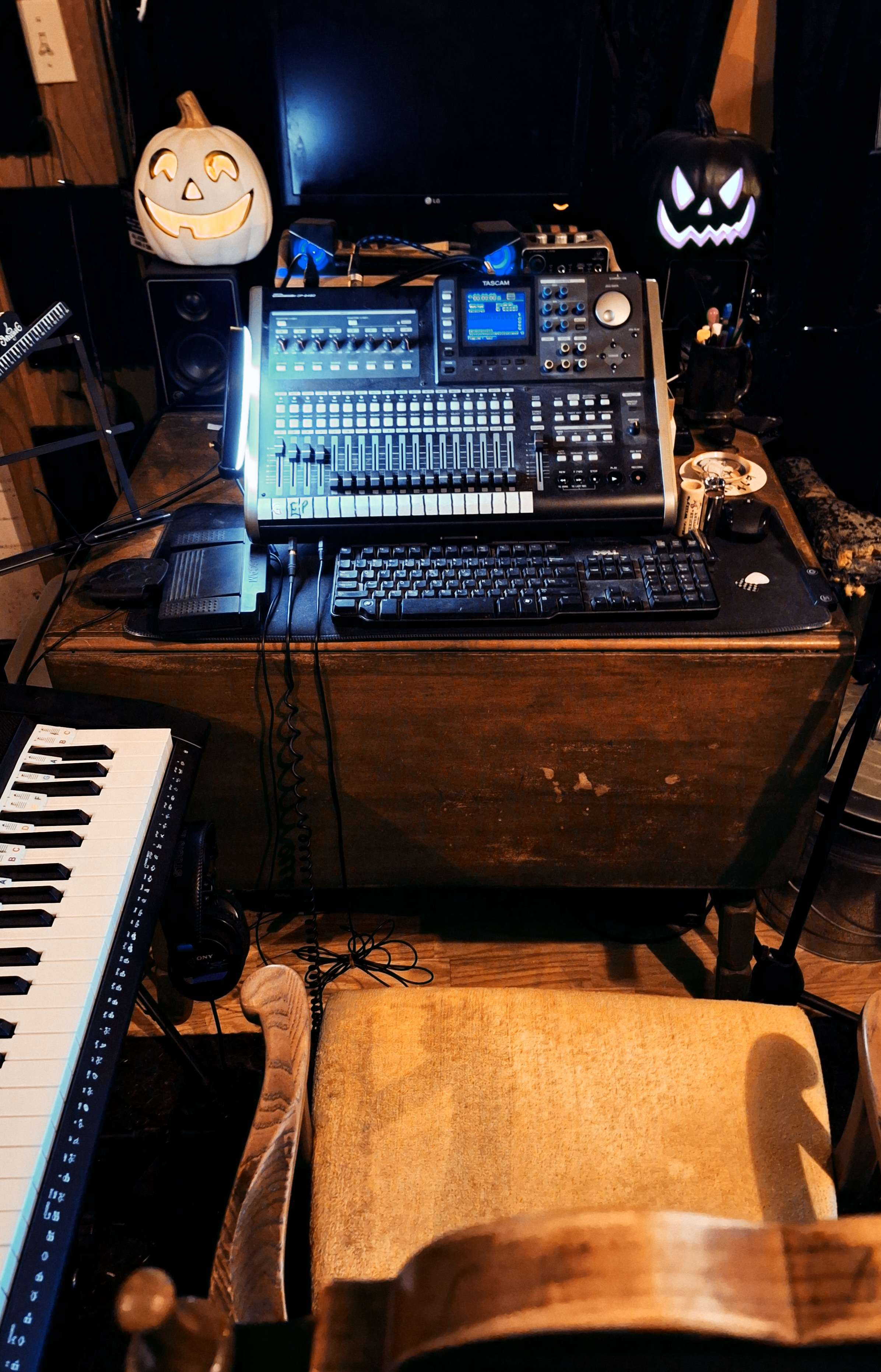 a wooden chair next to a keyboard