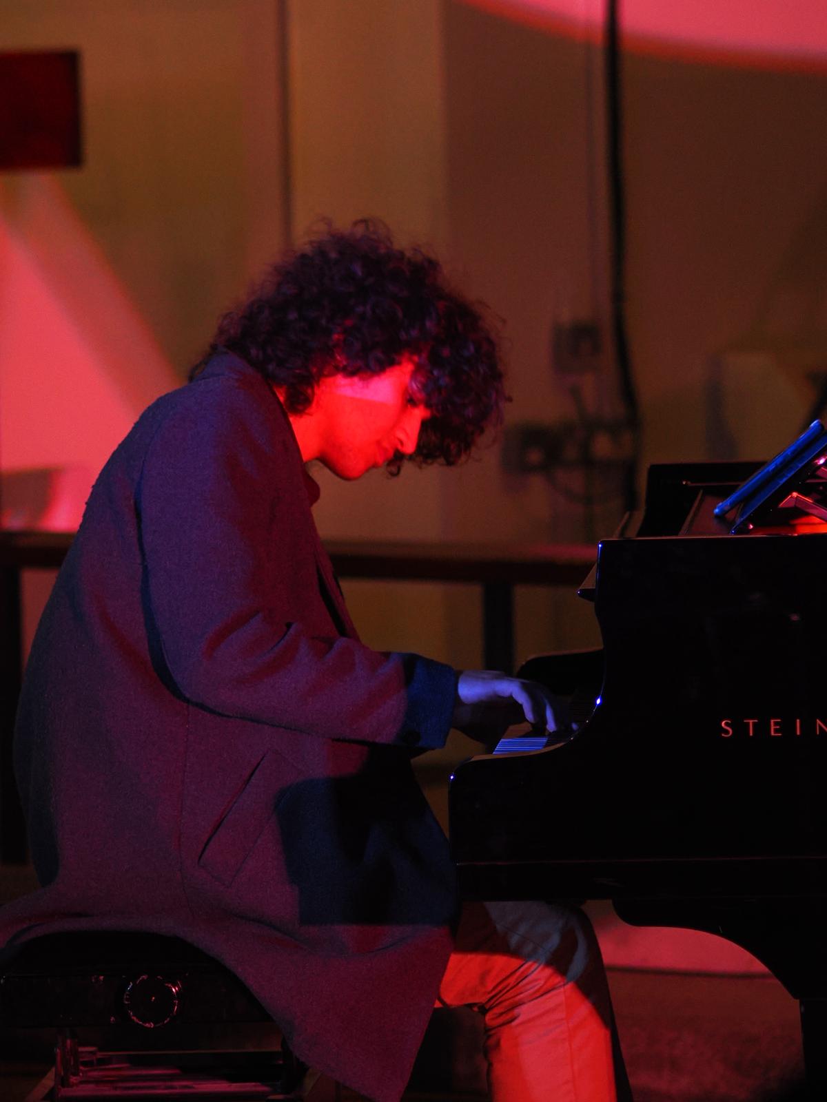 a man playing a piano