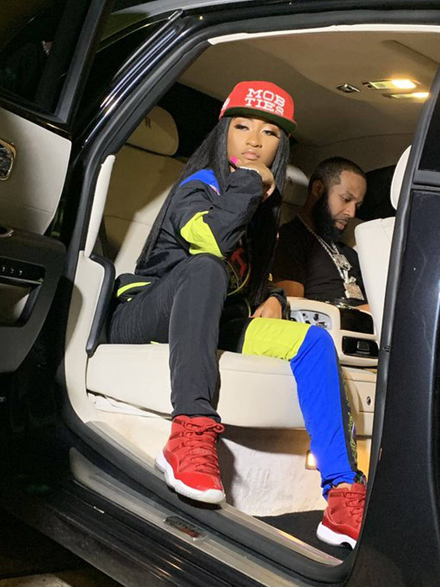 Young Lyric - Whim Whammie freestyle: a woman sitting in the back seat of a car