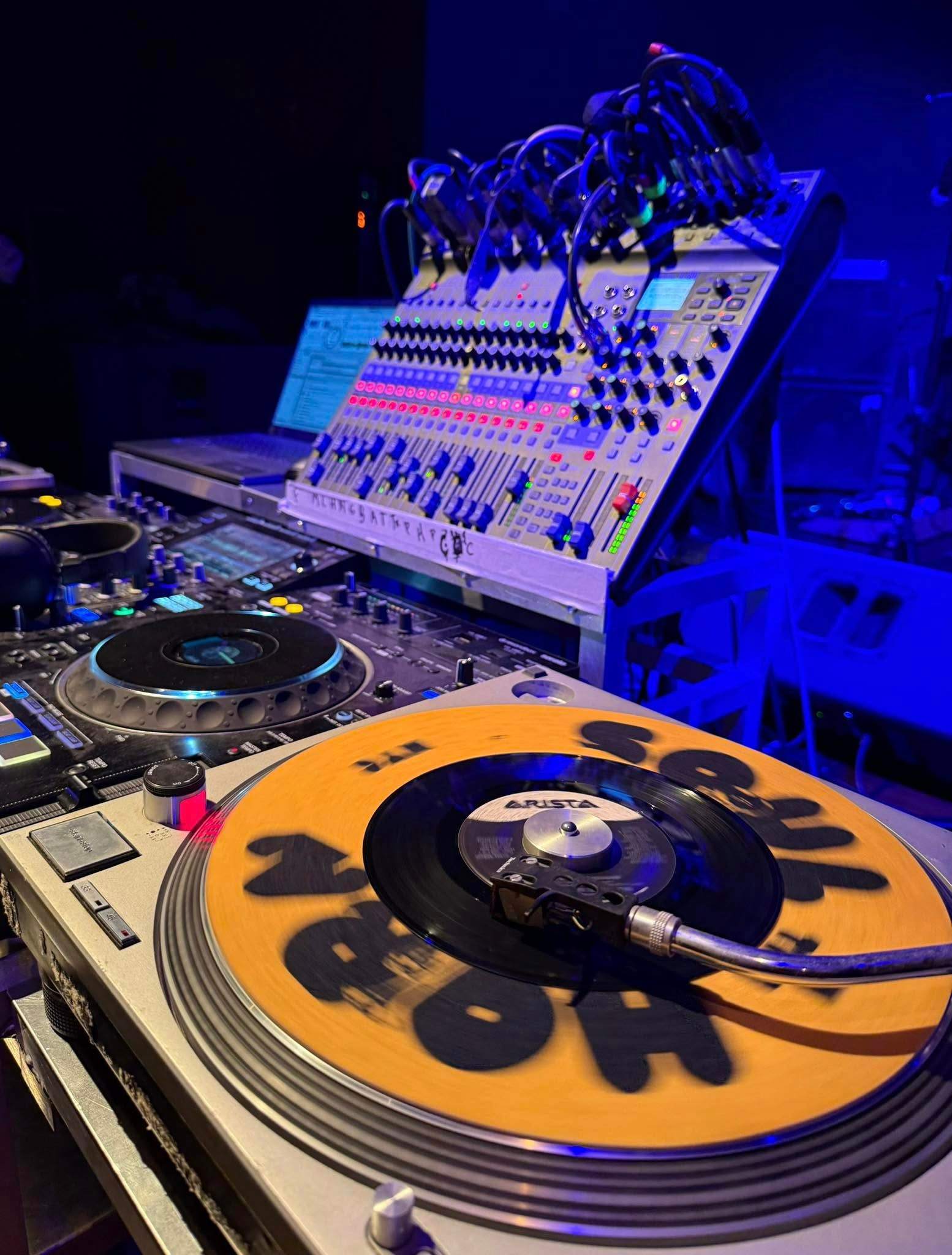 a dj set up on a stage