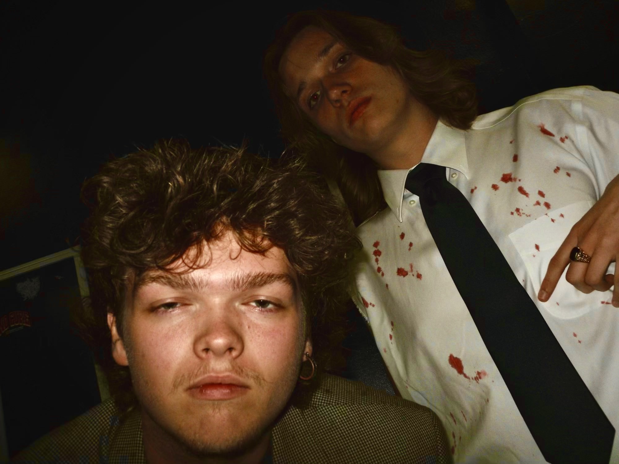 a man with blood on his face