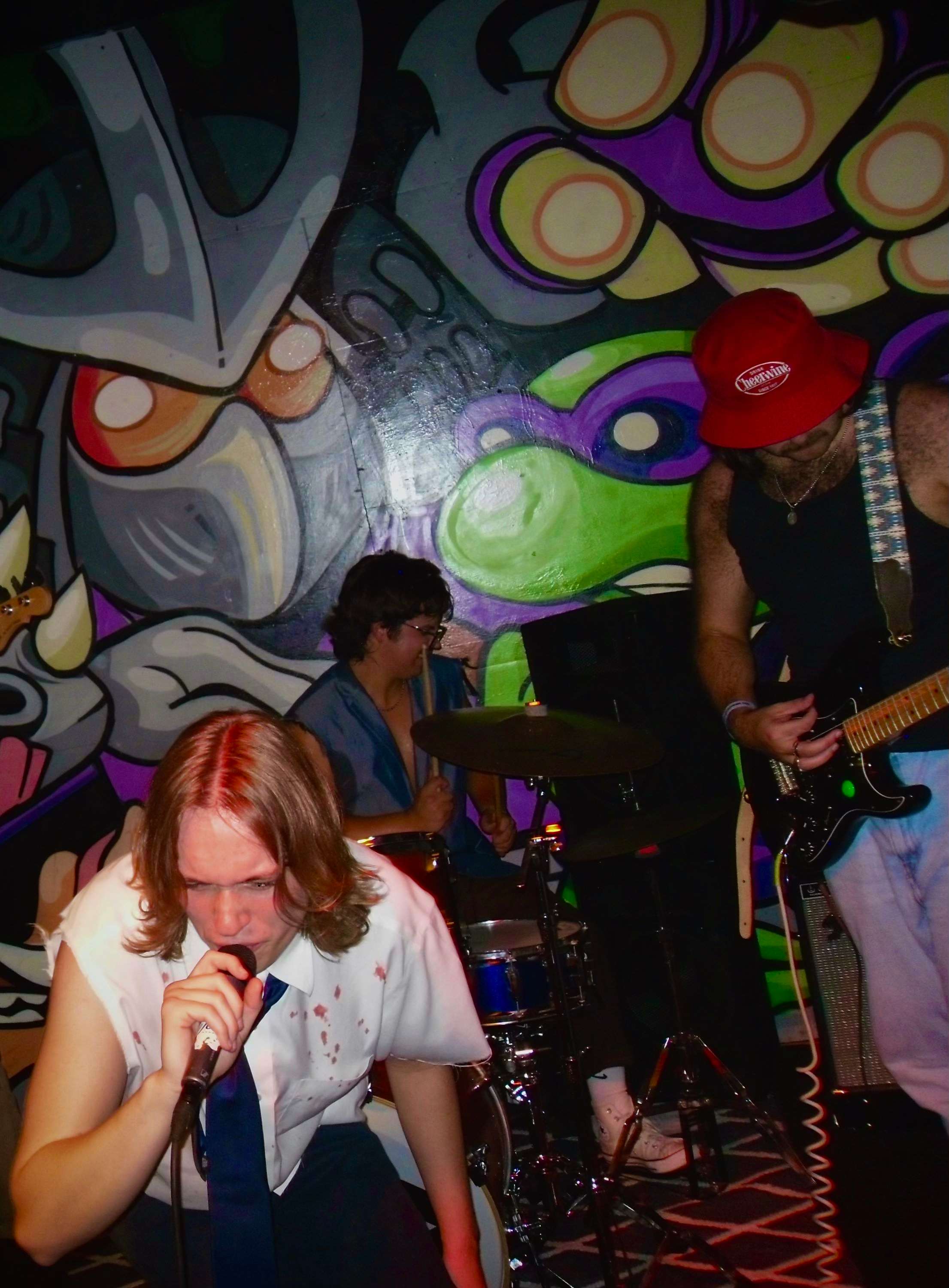 a man is playing a guitar