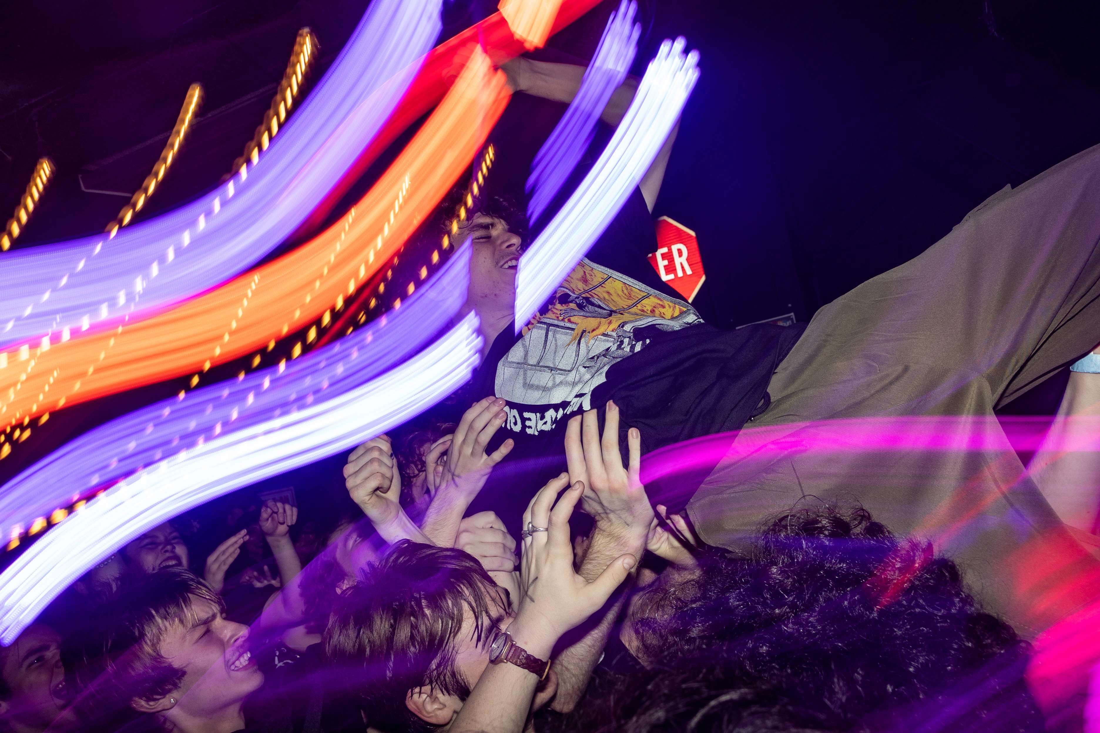 a group of people in a crowd at a concert