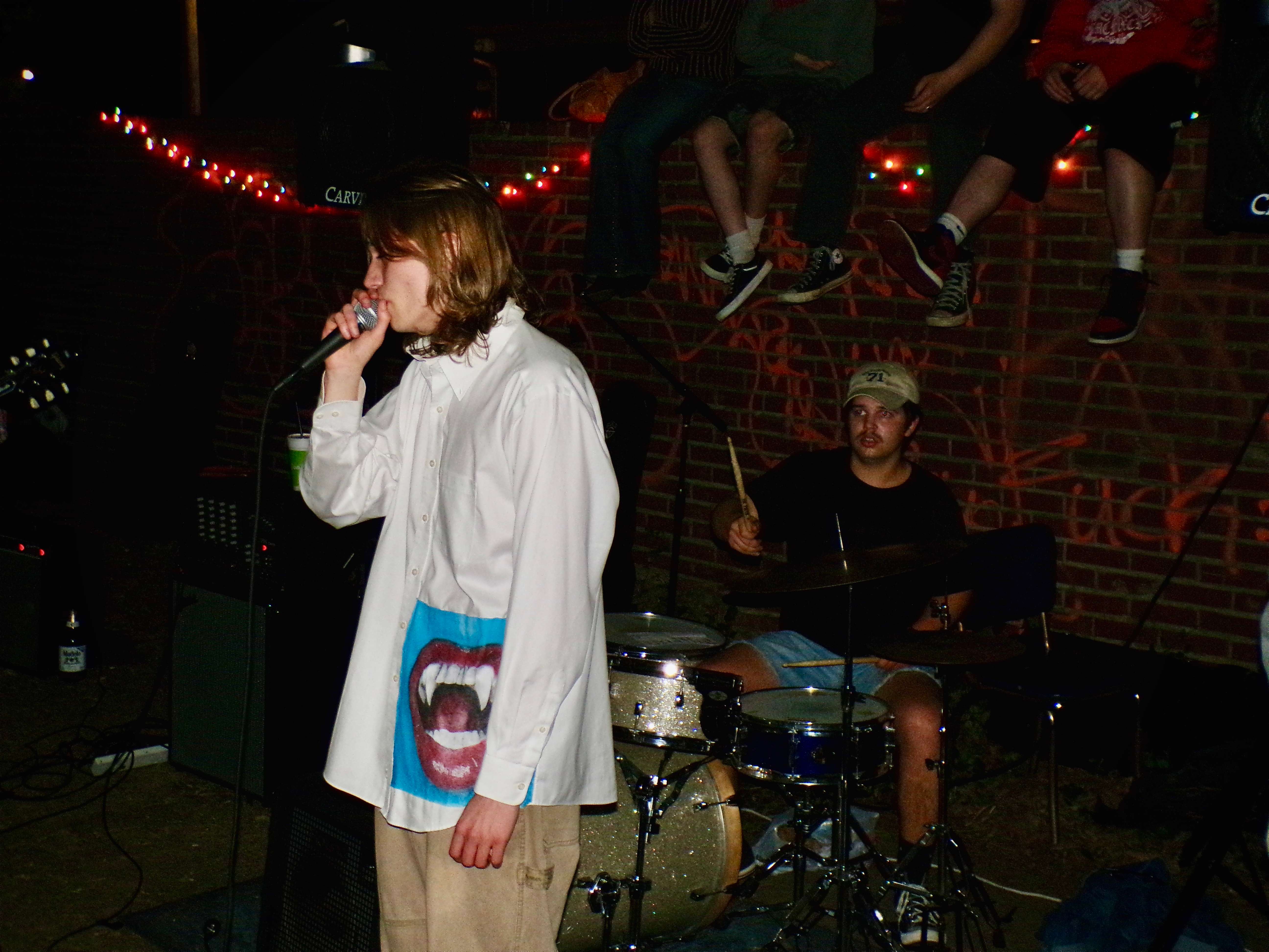 a man wearing a white shirt