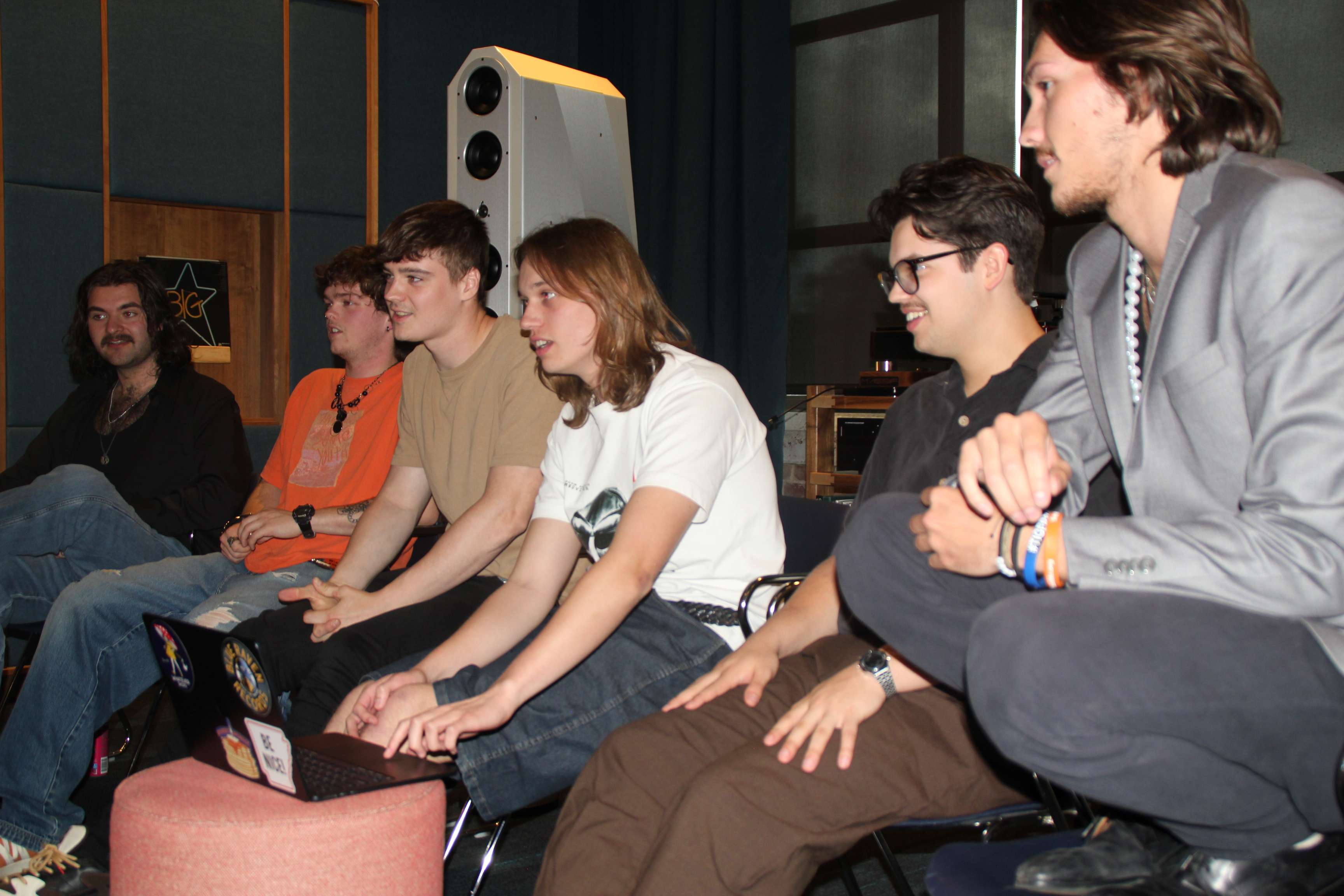 a group of people sitting in a room