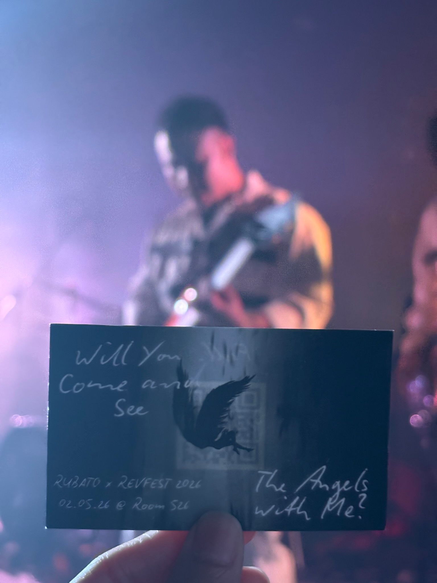 a person holding up a card with the words will you come see me