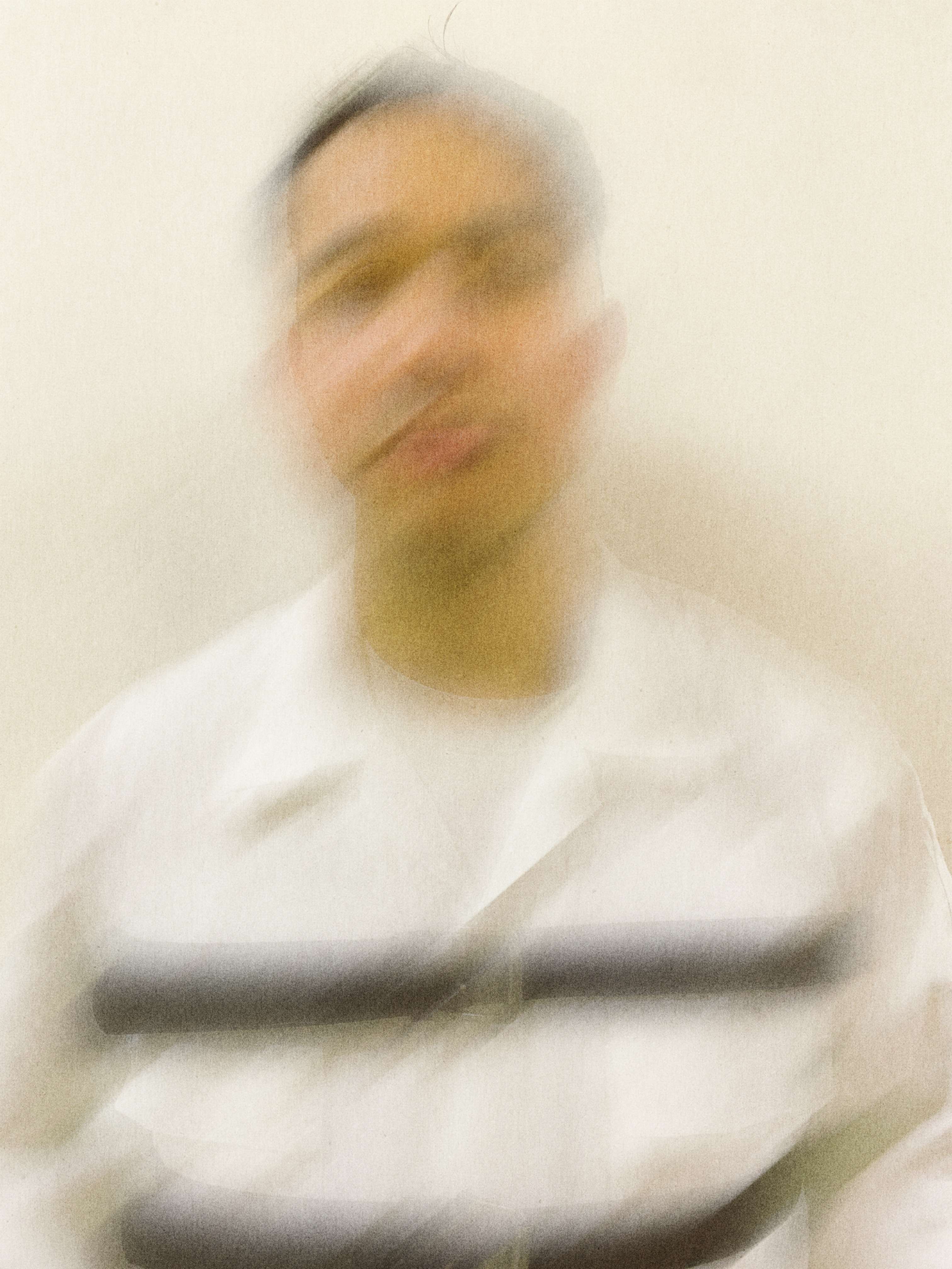 a man in a prison uniform