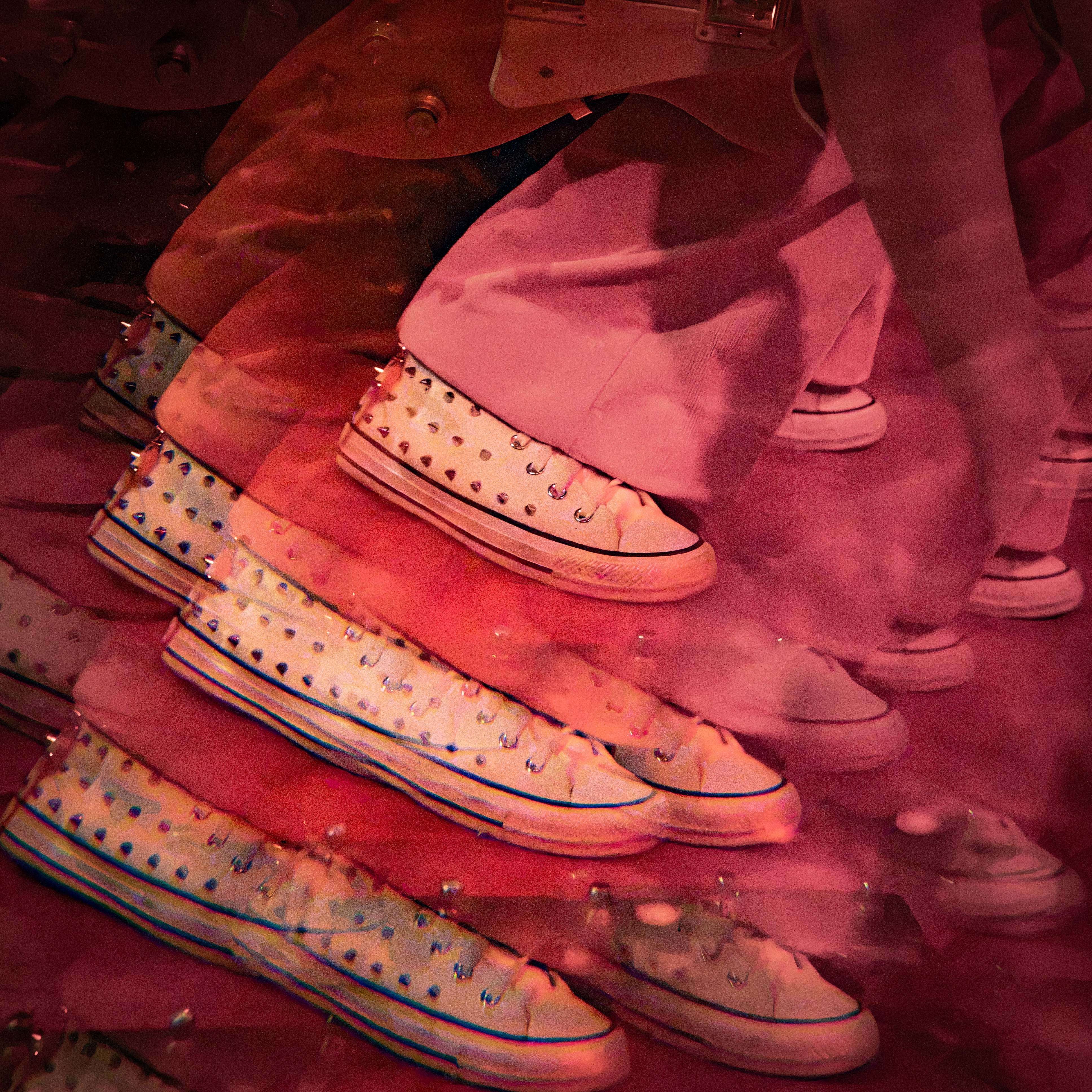 Mihka Chee - Nice Girls: a person is walking in a pair of sneakers