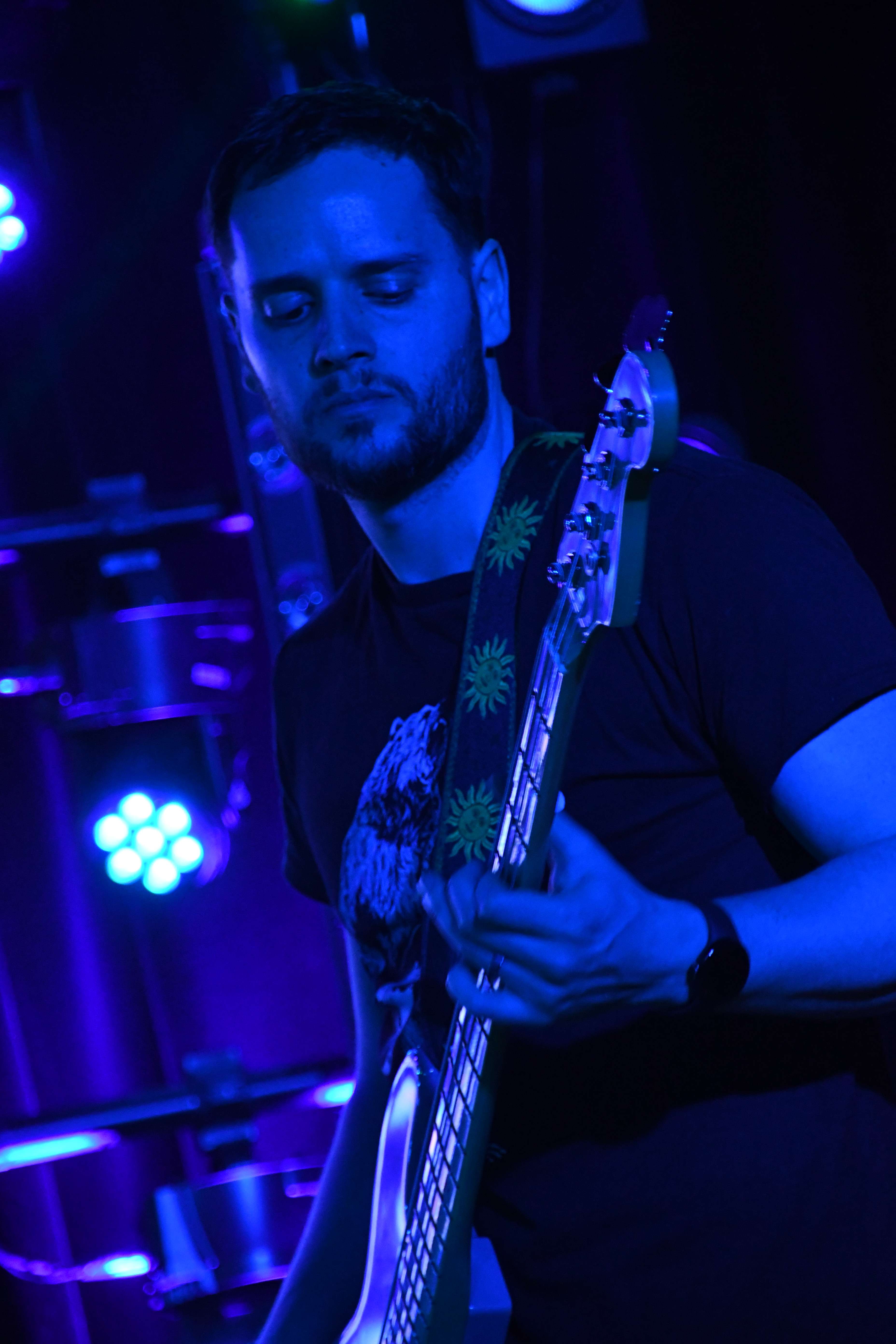 a man playing a bass