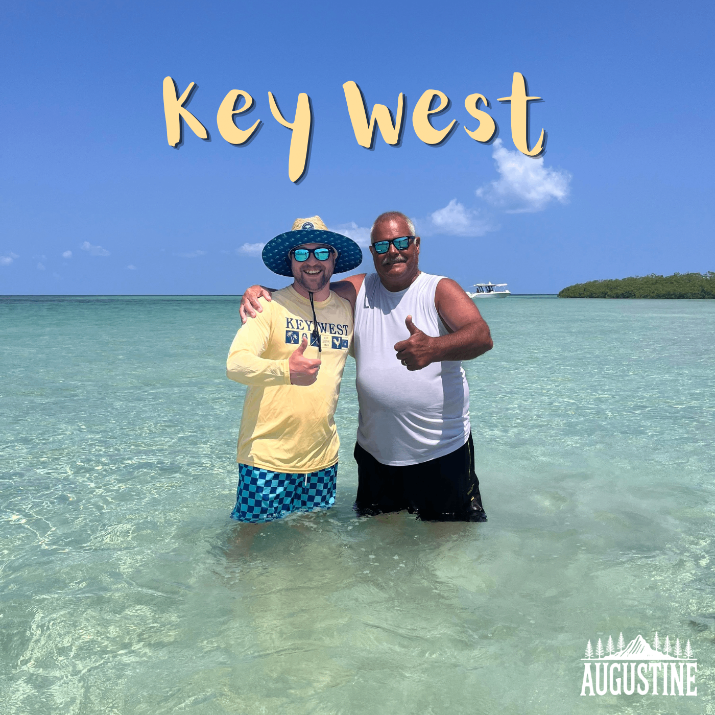 two men standing in the water with the text key west