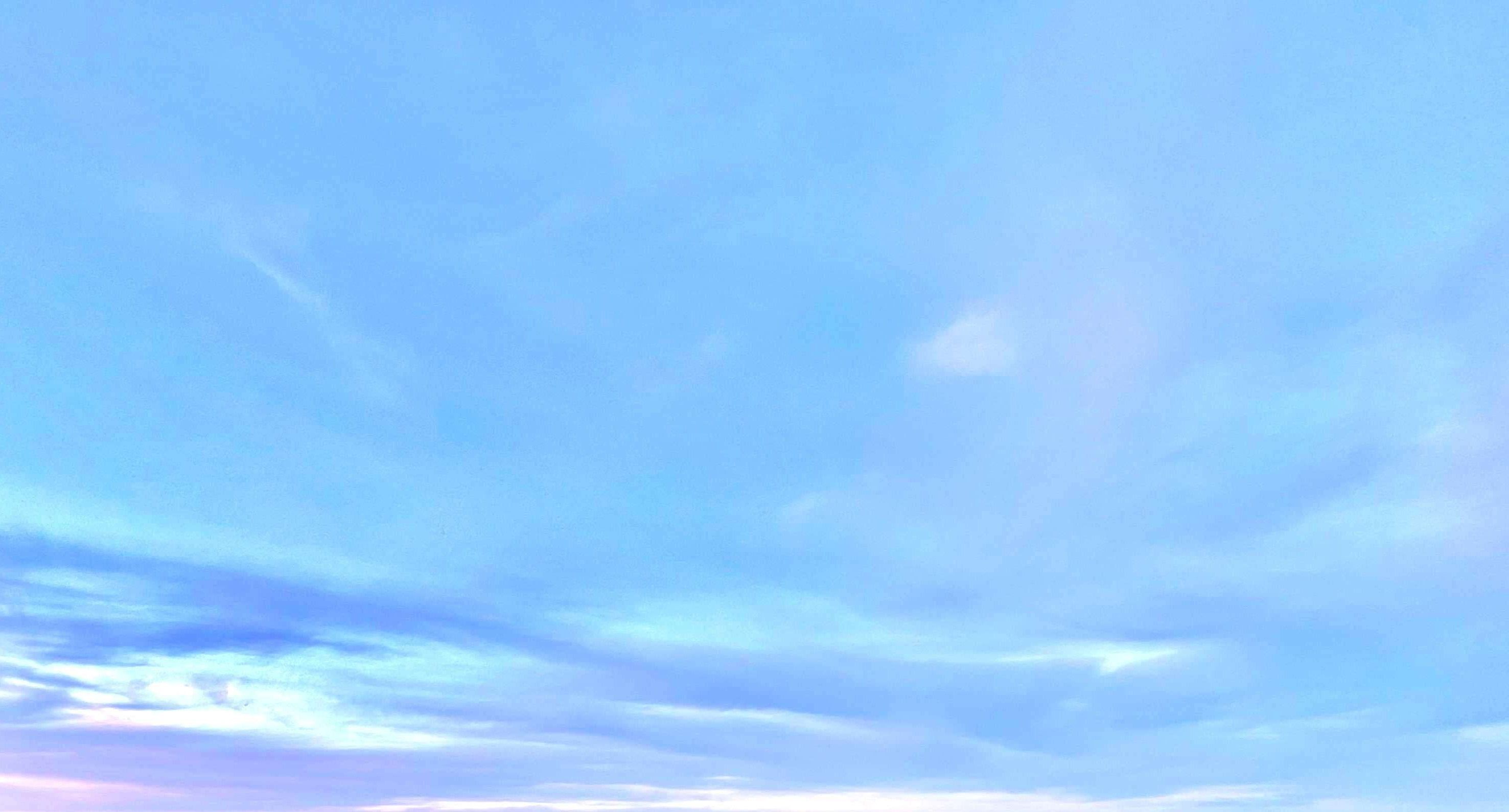 a man is flying a kite in the sky