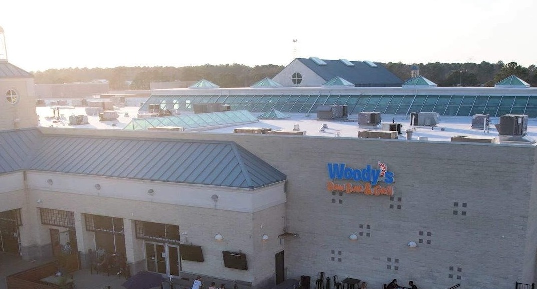 the roof of a large building with a lot of people