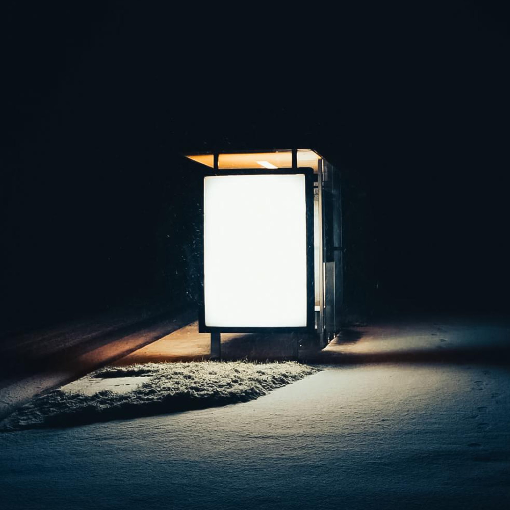 a light box in the snow at night