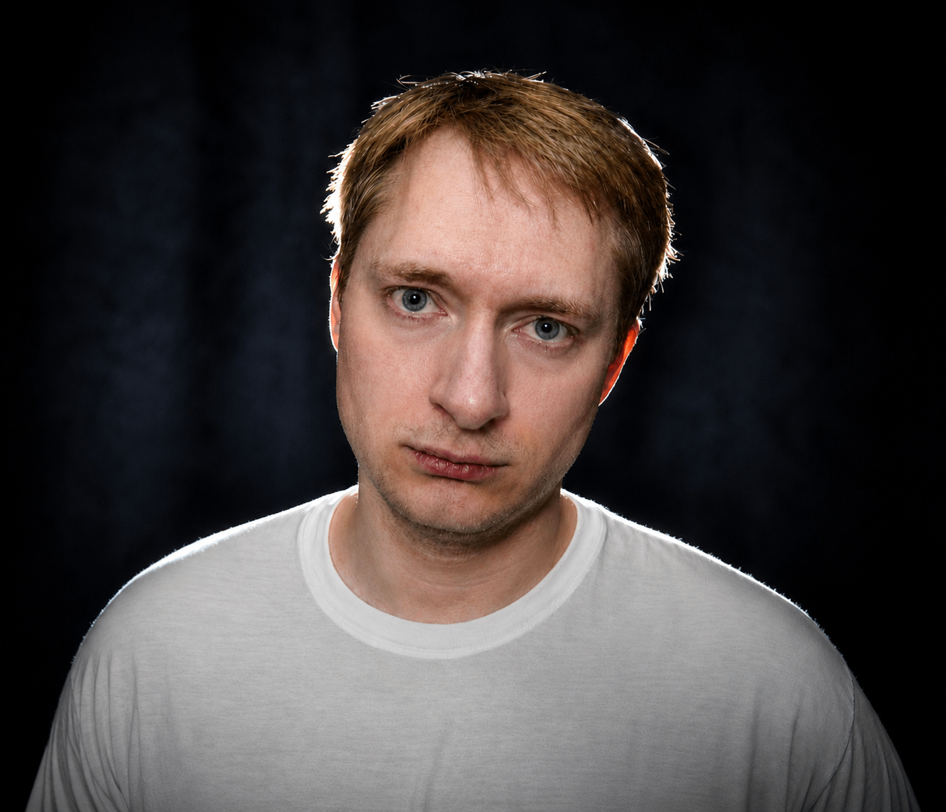 a man in a white t-shirt
